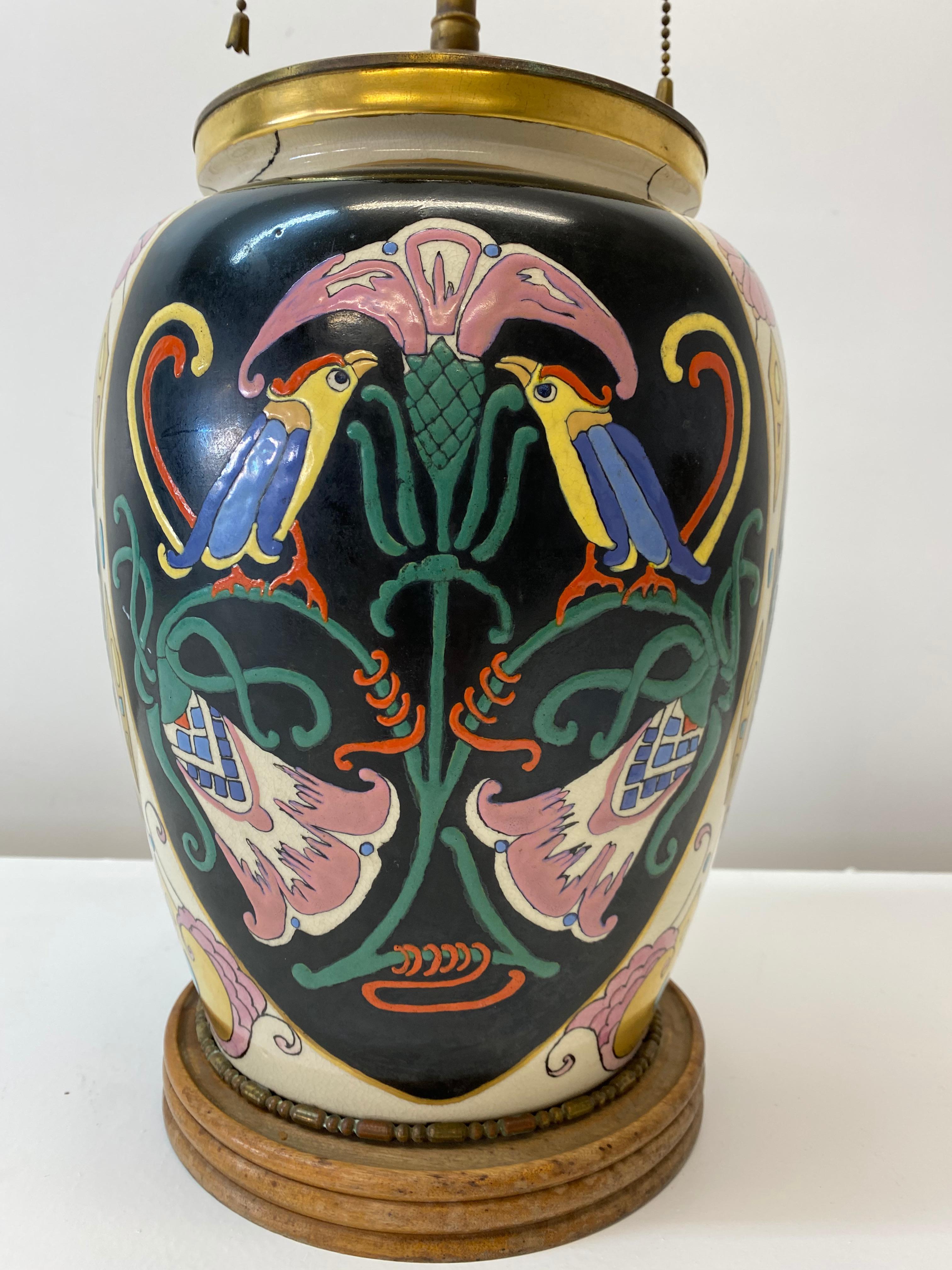 Antique Art Nouveau ceramic vase table lamp conversion for Restoration

Absolutely gorgeous handmade, hand painted Art Nouveau vase, circa 1890-1910

The vase was converted into a table lamp, circa 1920s-1930s

Measures: 7.5