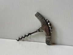 Tire-bouchon ancien Art Nouveau en étain et acier