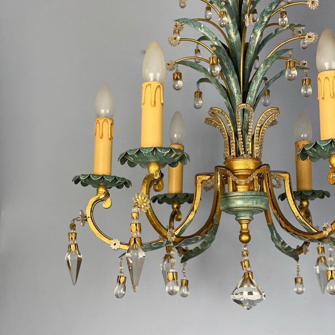 - Graceful antique Franch chandelier
- Made of green enamelled metal covered with delicate gilding and crystal of a rare shape.
- Circa 1910s.