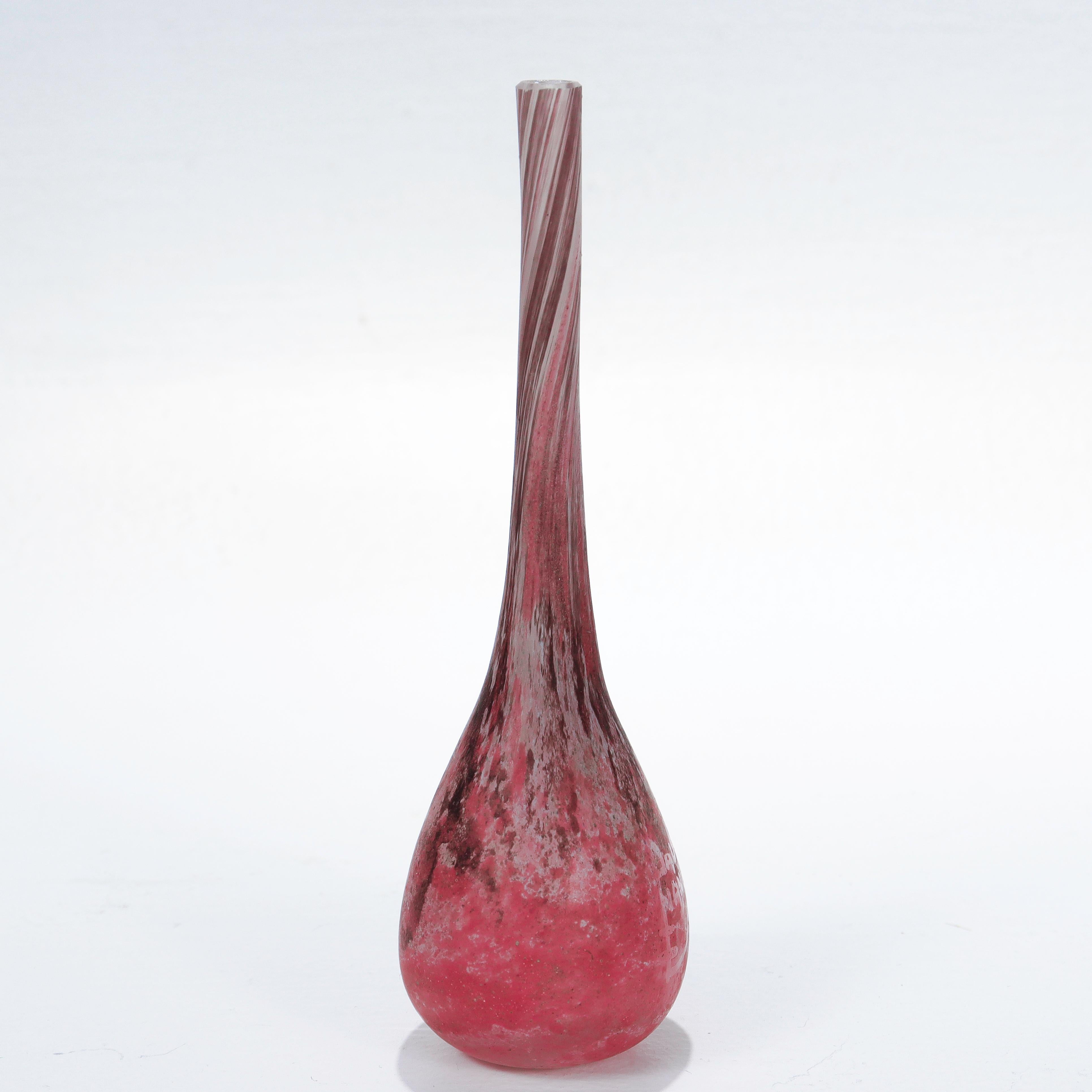 A very fine miniature French art glass vase.

By Daum.

In a pink, purple, and grey mottled color palette.

With an elongated slender neck and acid-etched 