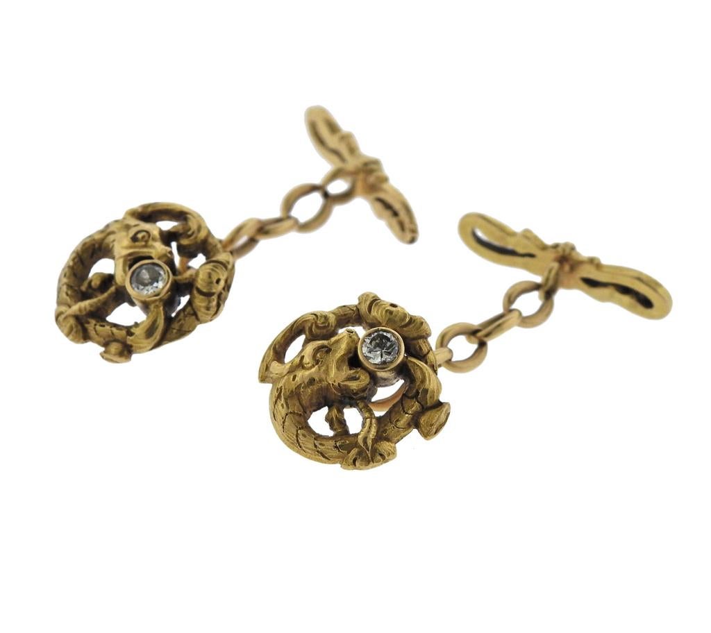 Pair of 18k yellow gold Dragon cufflinks, created during Art Nouveau era, set with approx. 0.20ctw in diamonds. Cufflink top is 15mm x 15mm, weight is 12 grams. Marked k18.