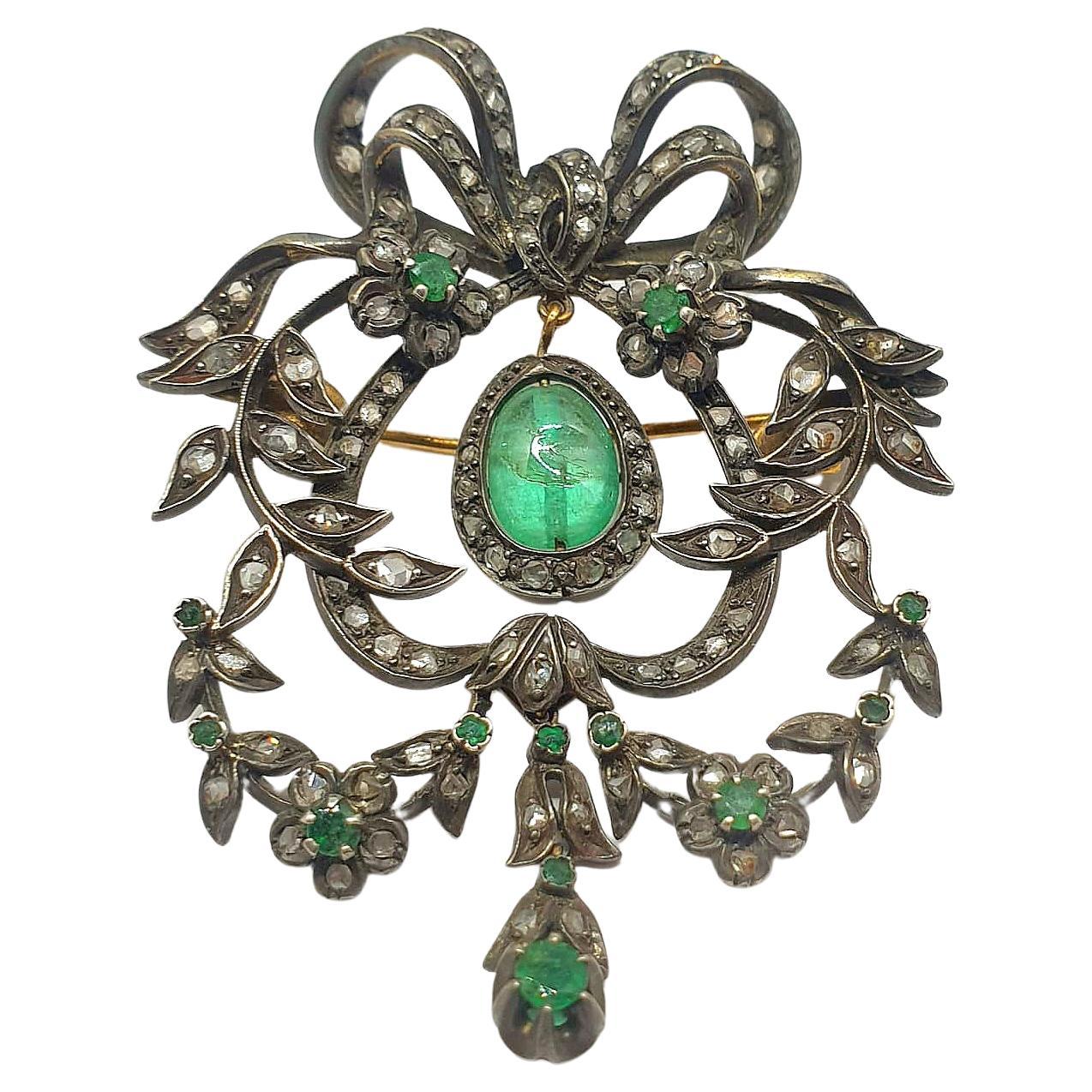 Ciondolo e spilla antichi in stile Art Nouveau con smeraldo e diamanti