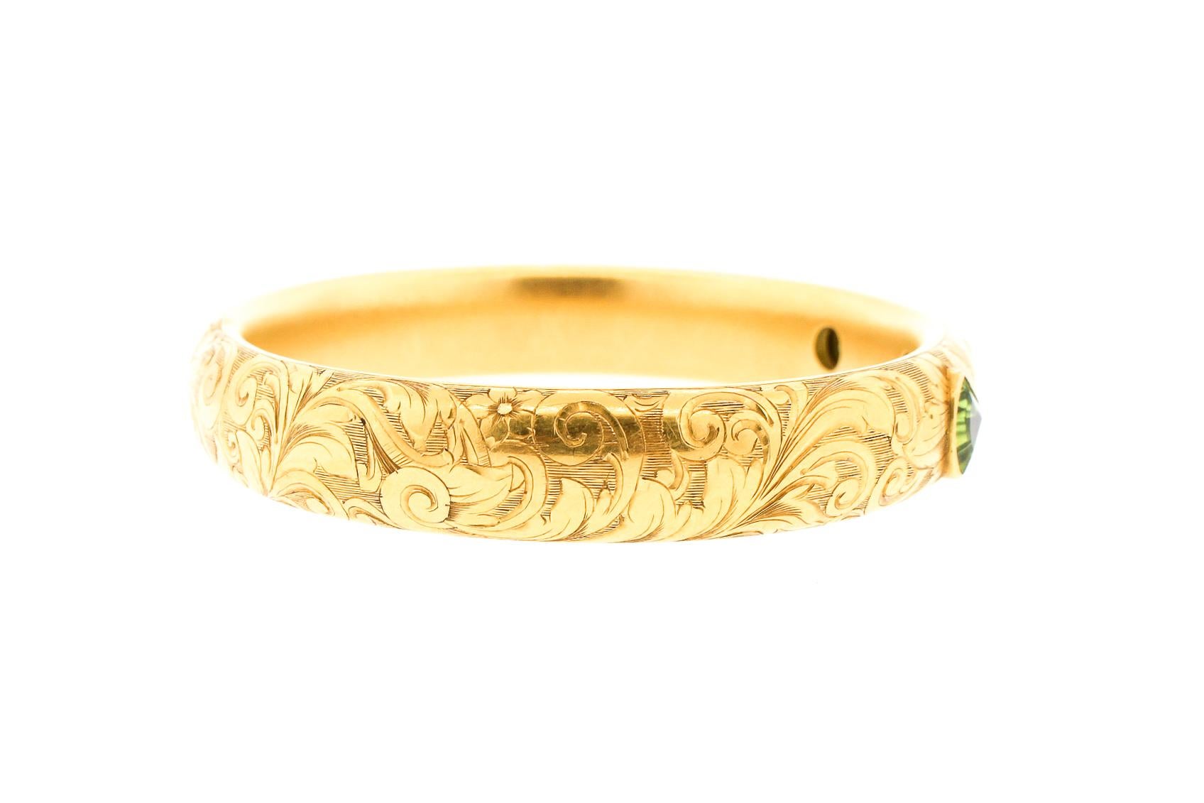 Antique Art Nouveau Engraved 14 Karat Gold Peridot Hollow Form Bangle Bracelet In Good Condition In New York, NY