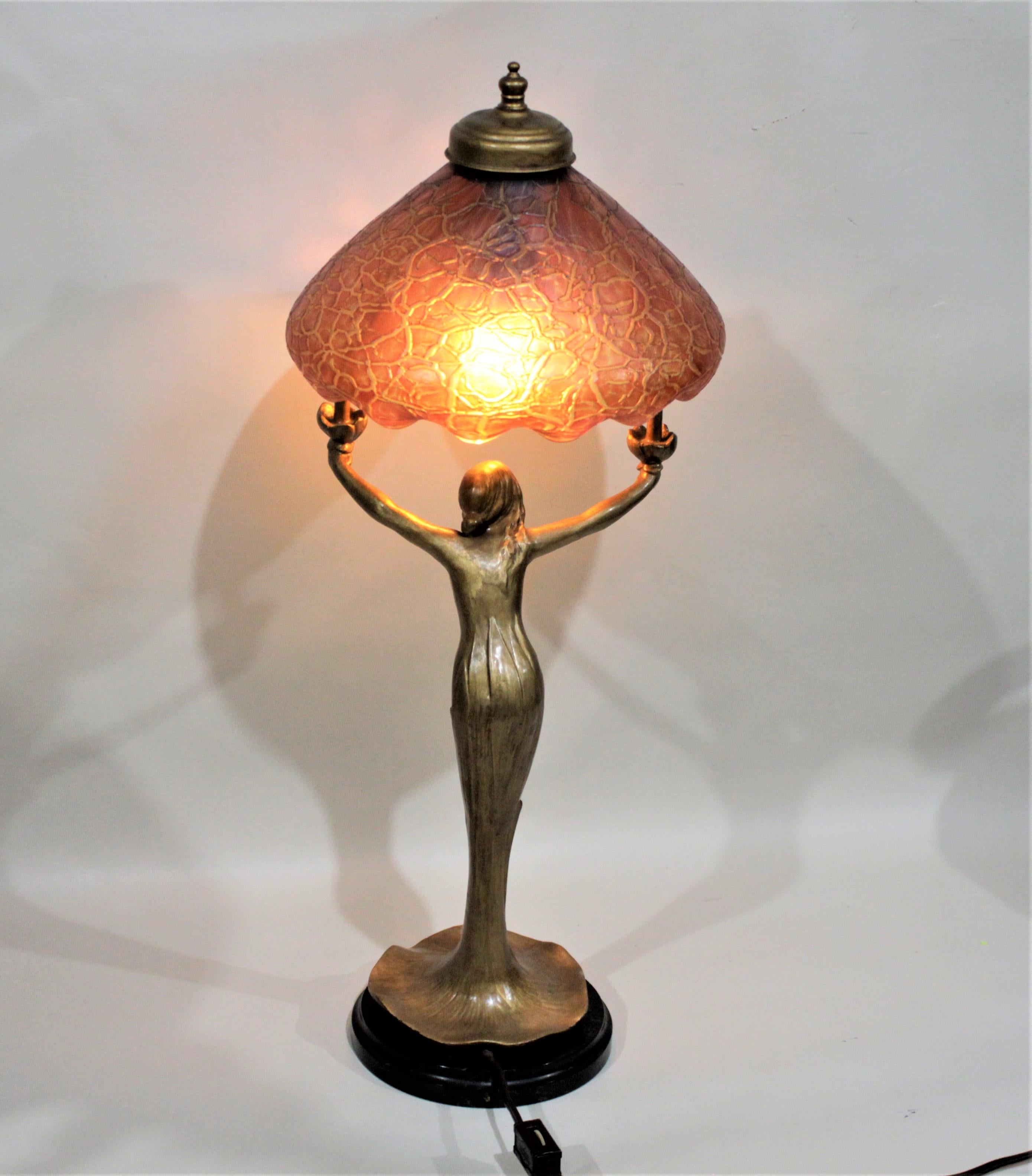 art nouveau lamp woman