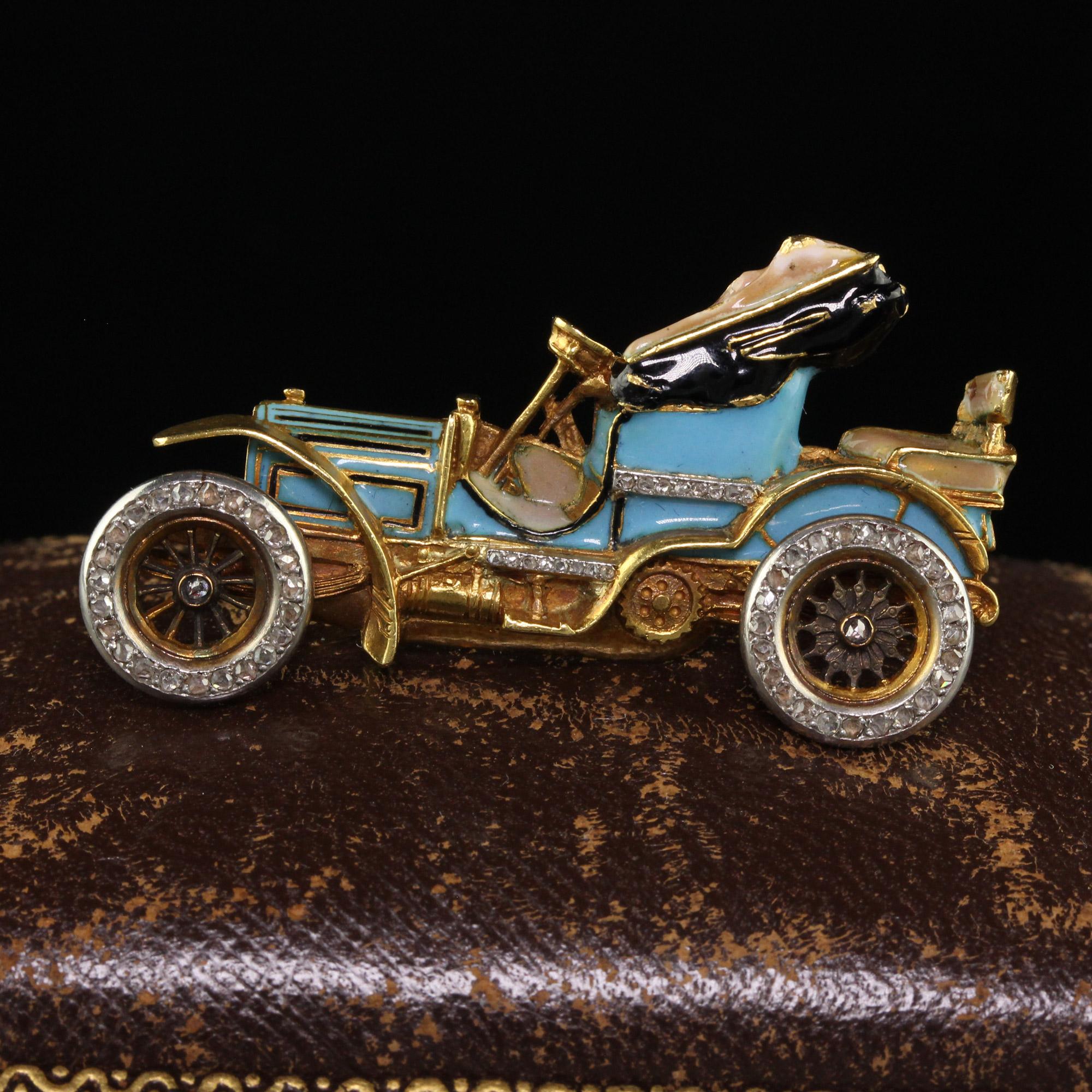Beautiful Antique Art Nouveau French 18K Yellow Gold Old Cut Diamond Enamel Buggy Car Pin. This incredible one of a kind Art Nouveau French buggy car is crafted in 18k yellow gold and platinum. This pin features a buggy car that has old cut diamonds