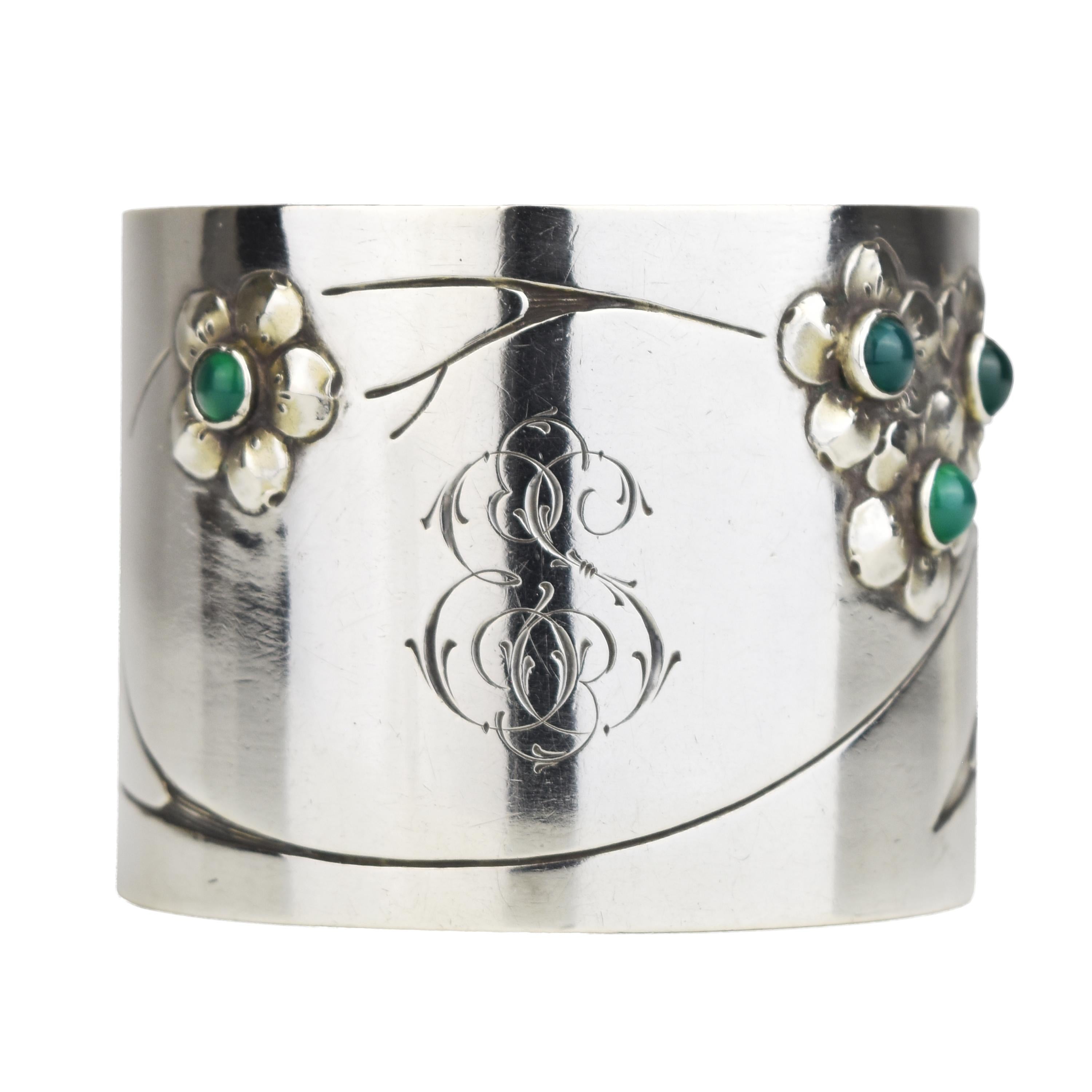 The antique Art Nouveau German 0.800 silver napkin ring is a stunning and intricately crafted piece of silverware that reflects the elegance and artistic style of the Art Nouveau period. The 0.800 silver hallmark indicates the purity of the silver