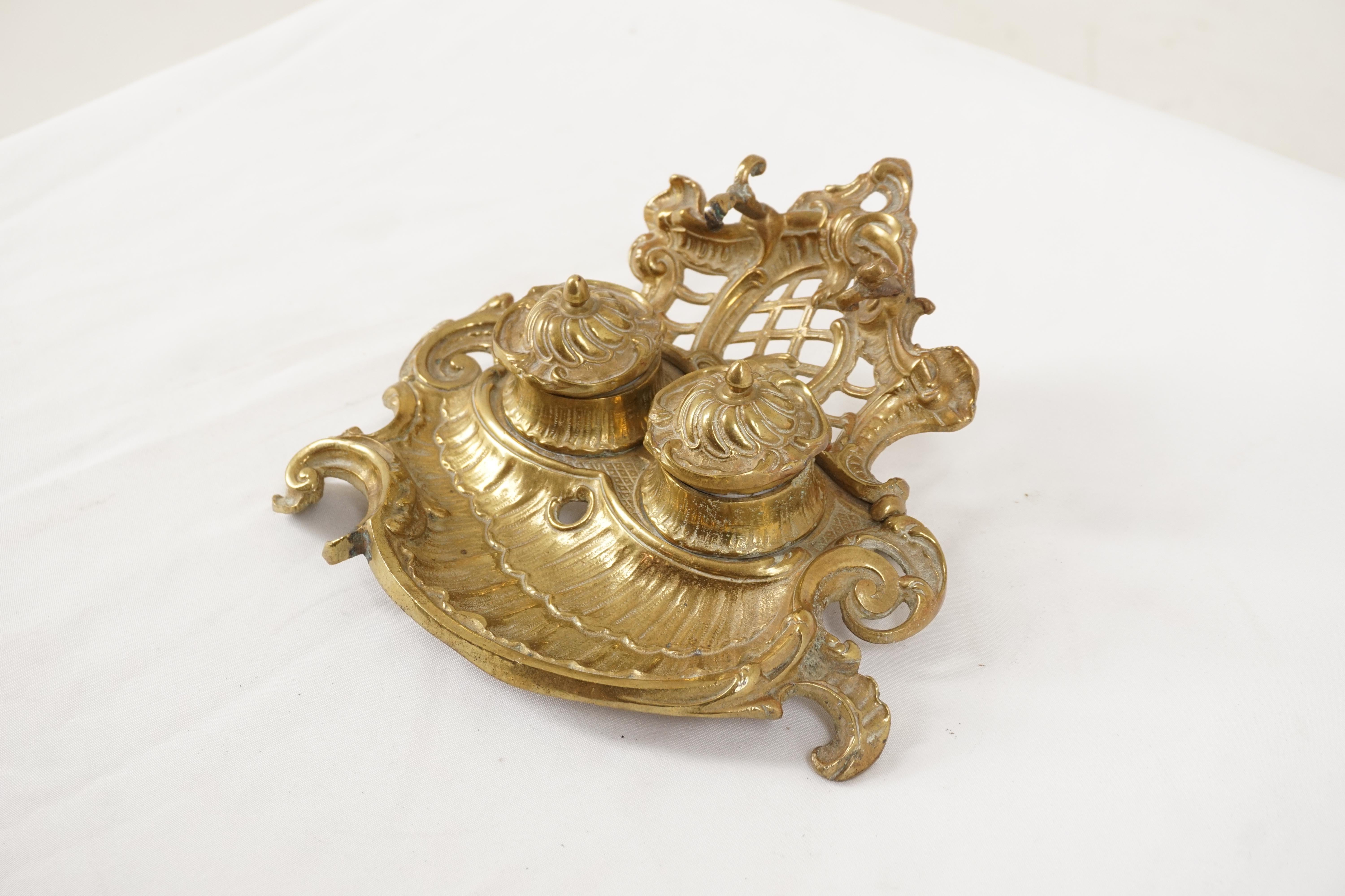 Antique Art Nouveau gilt bronze & brose double inkstand, Scotland 1910, H547

Scotland 1910
Brass 
Shaped back with pen rest.
Pair of inkwells with ceramic inserts. 
All standing on shaped brass feet.

H547

Measures: 9