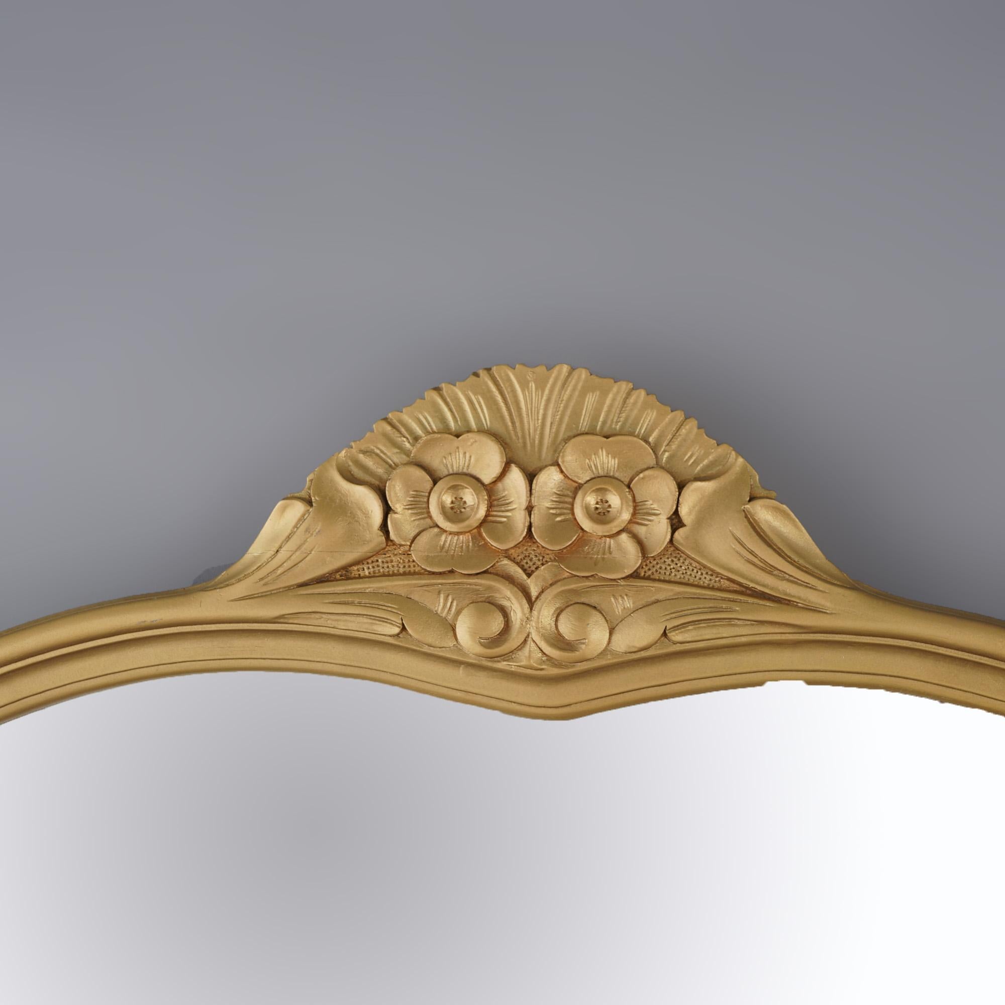 An antique Art Nouveau triptych wall mirror offers giltwood construction with floral crest over three shaped mirrors, c1920

Measures - 29.5