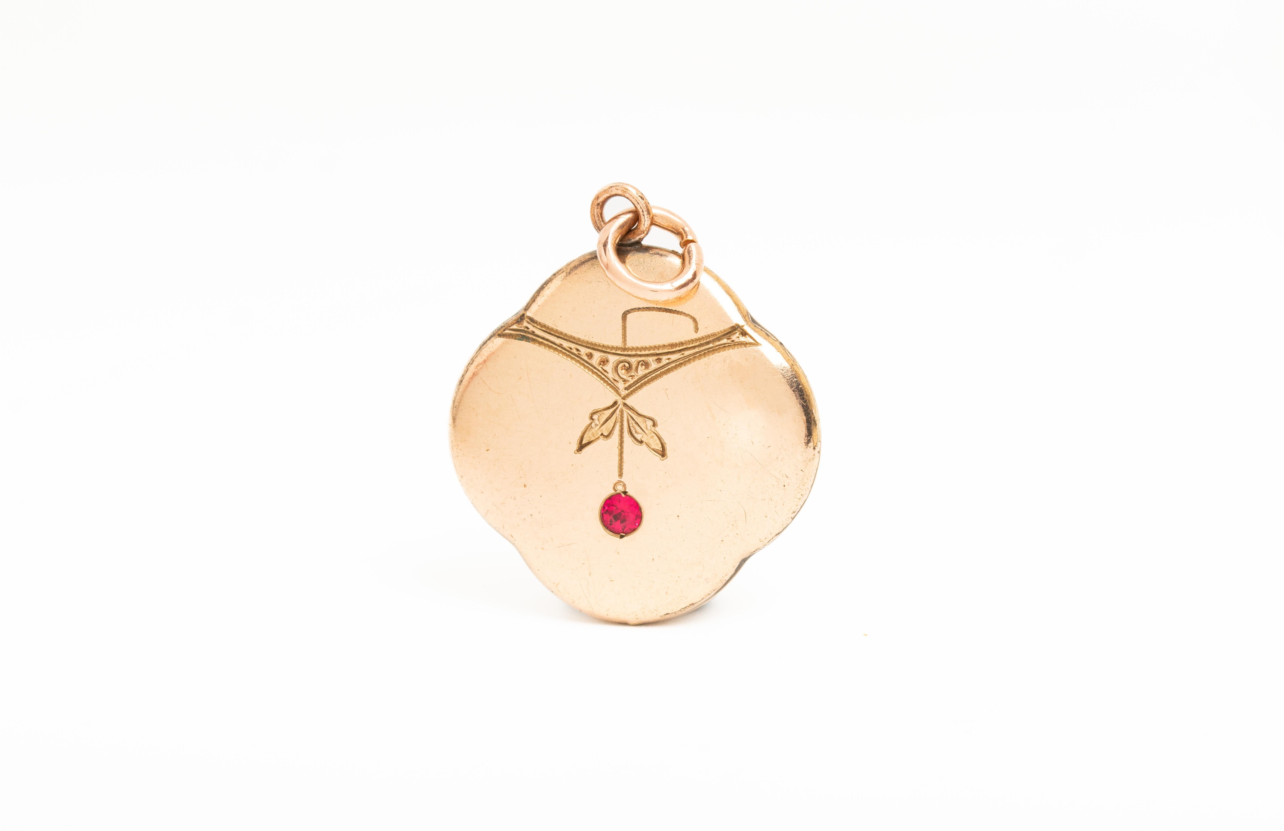 Round Cut Art Nouveau Gold Plated Engraved Pendant With A Ruby For Sale