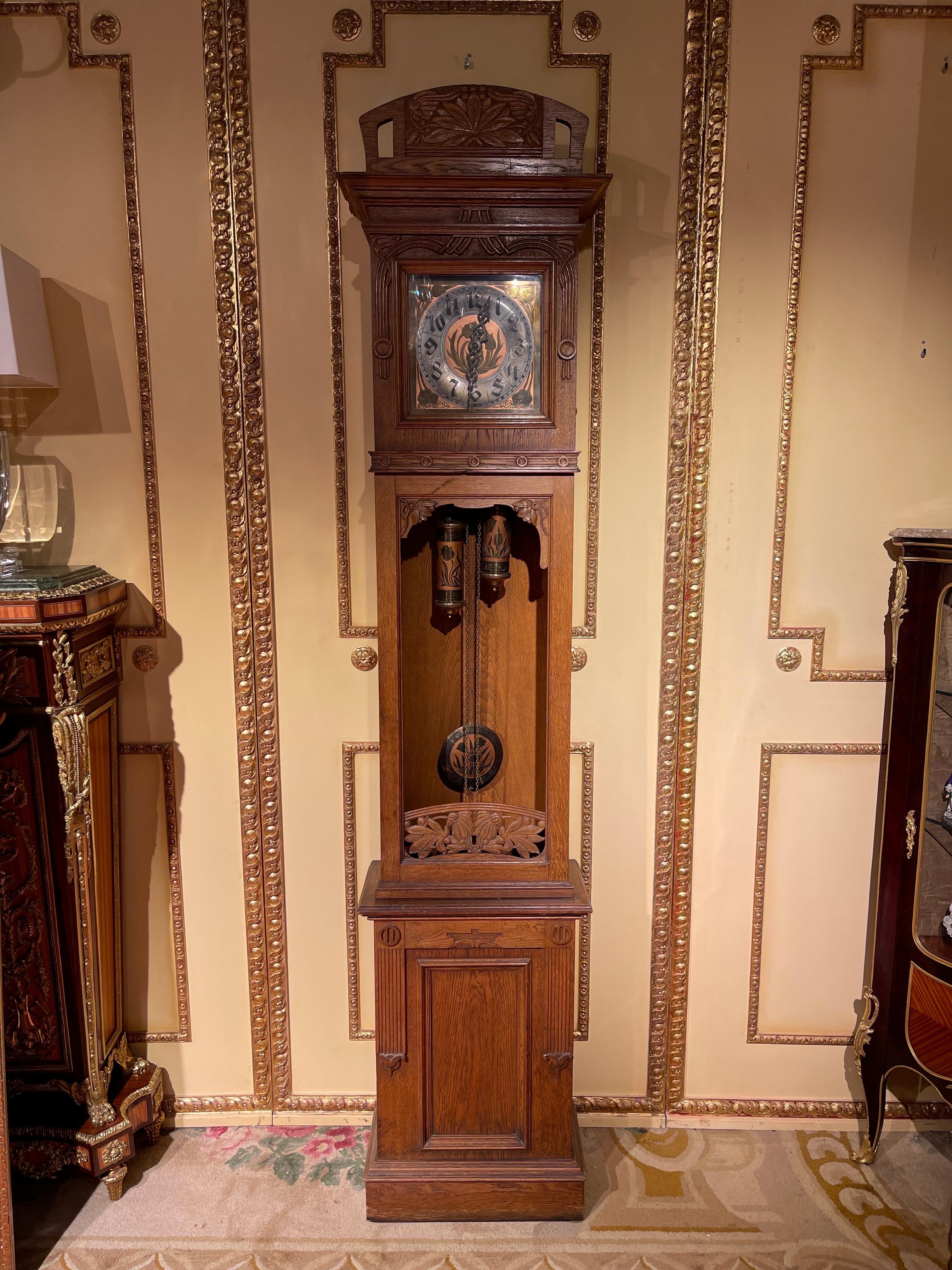 Antique Art Nouveau grandfather clock, Germany 1900.

Solid oak wood, finely carved body with carved floral accents. The movement is an original work by Gustav-Becker in Germany.

*Gustav Becker is known for its high-quality, durable and solid