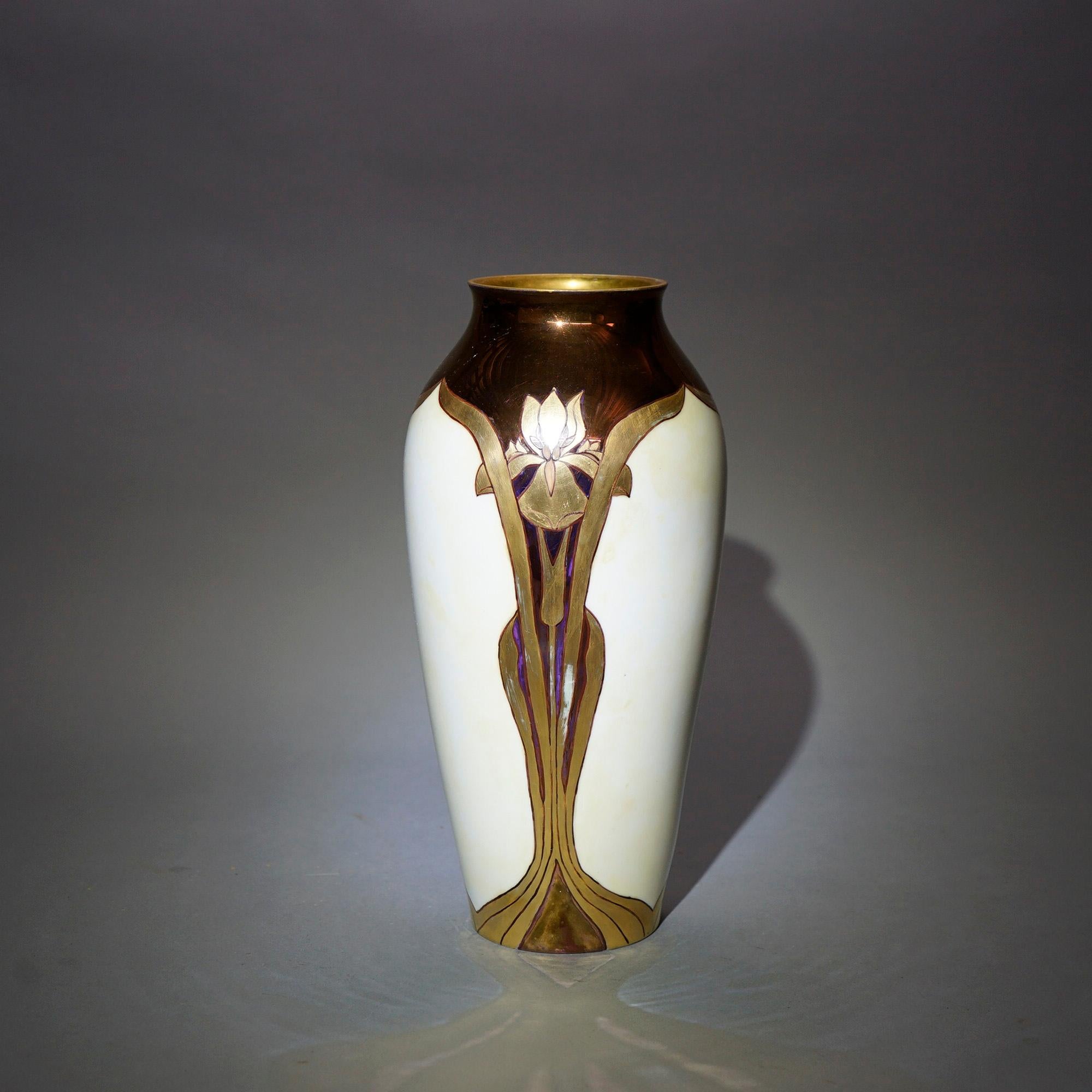 An antique Art Nouveau French Limoges porcelain vase offers hand painted and gilt stylized iris (flower), signed and stamped as photographed, circa 1910

Measures- 13''H x 6.25''W x 6.25''D.