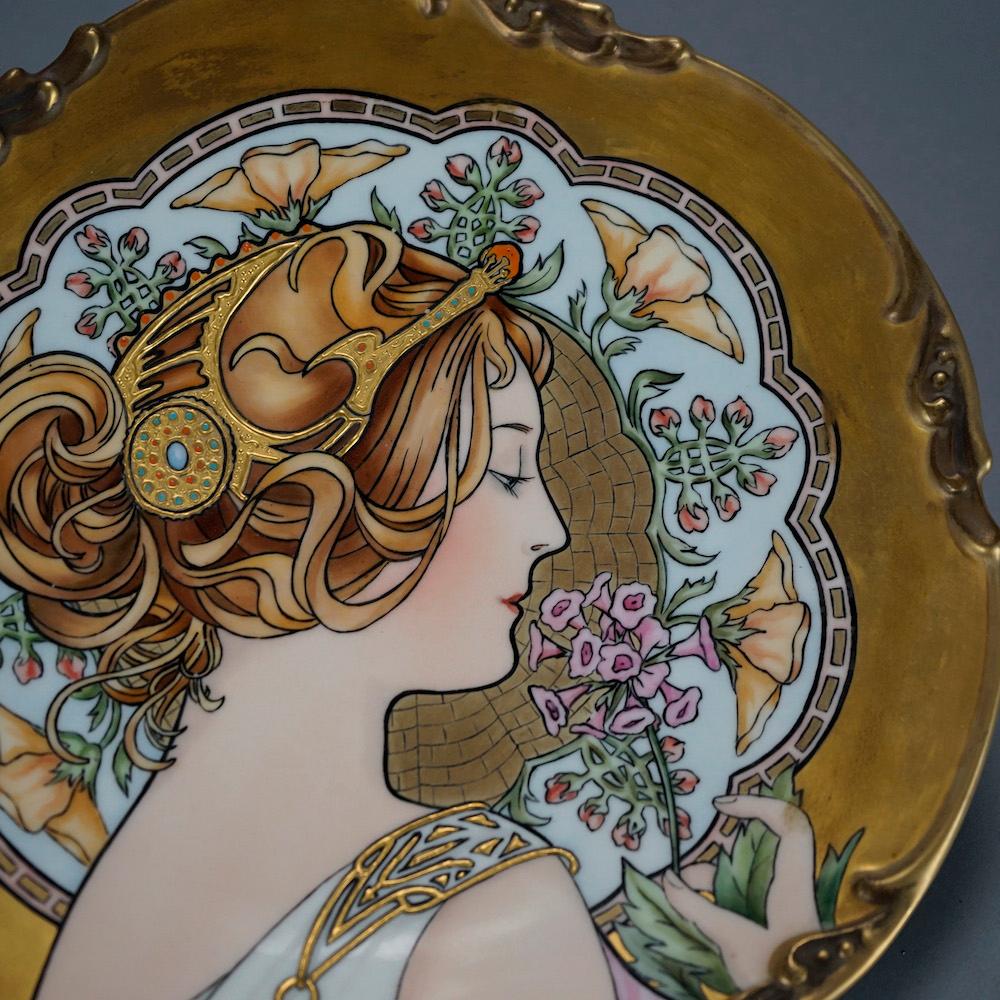 An antique French Art Nouoveau porcelain portrait plate by JPL (Jean Pouyat Limoges) offers hand painted and gilt portrait of Edith Bixler Laubach (of the retail elite, Bixler's Jewelry), en verso signed and dated as photographed, 1913.

Measures-
