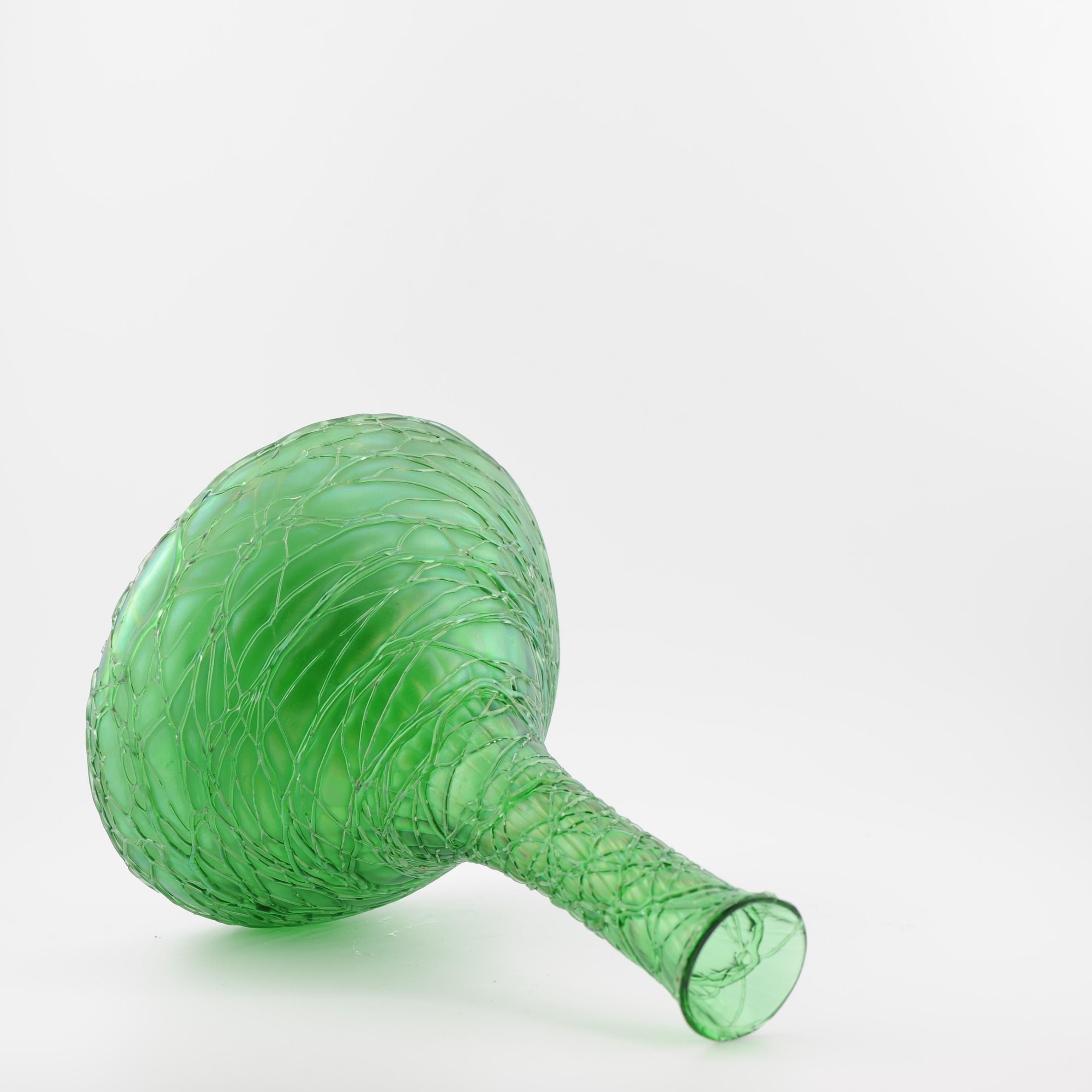 Antique Art Nouveau Hand Blown Czech Glass Vase by Loetz/Kralik, Circa 1900. The long-necked vase with a mallet shaped base and decorated in iridescent veining throughout.

7.5