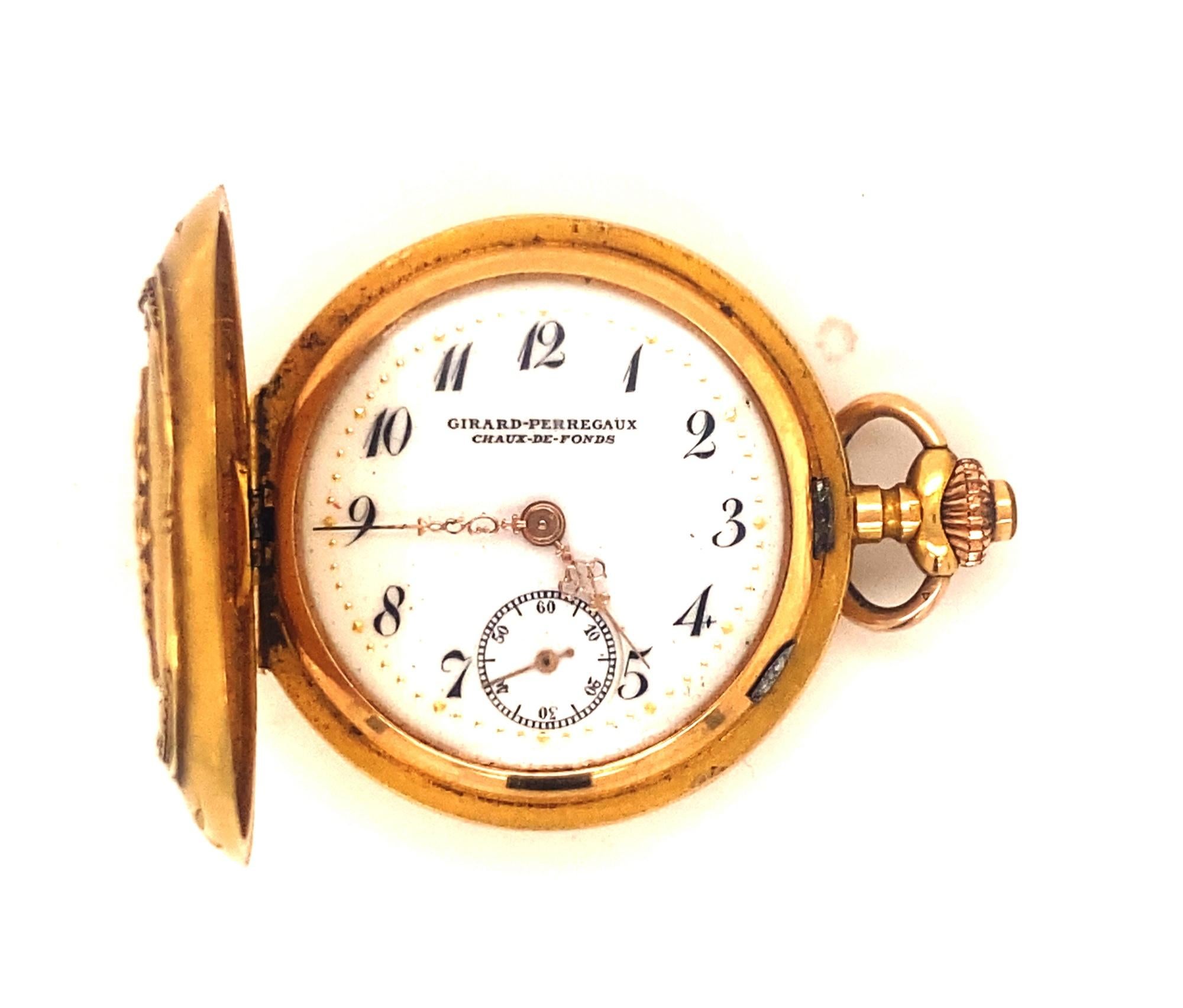 This is a beautiful antique art nouveau ladies hunter case pendant watch c.1900.  The watch is in excellent working condition.  The watch Art Nouveau design with a bouquet of flowers and rose cut diamonds.  Marked 18K inside Girad-Perregaux Hors