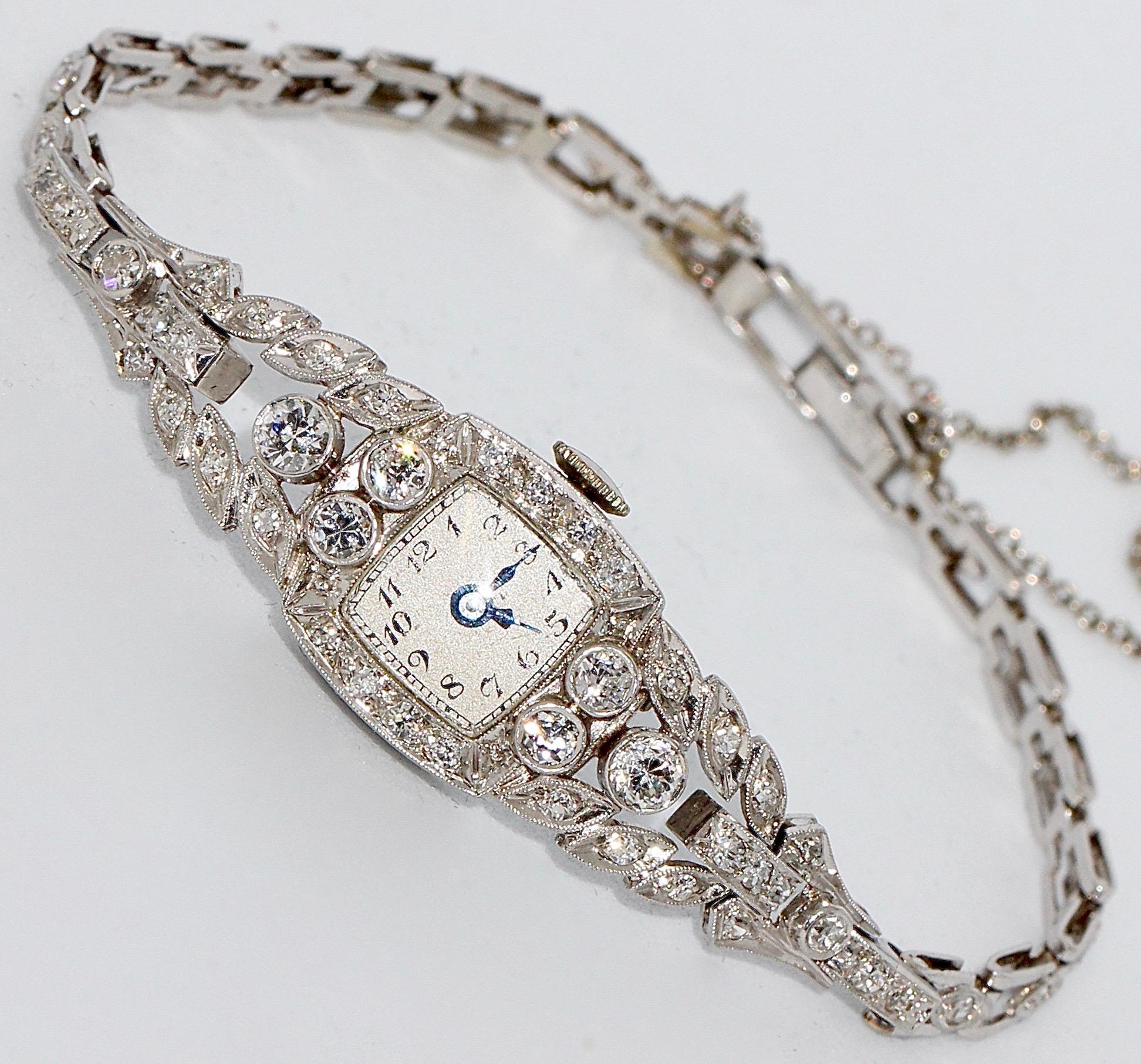 Antique Art Nouveau ladies watch, platinum with diamonds.

Case and strap are studded with diamonds throughout.

Manual wind movement.
Very good condition.