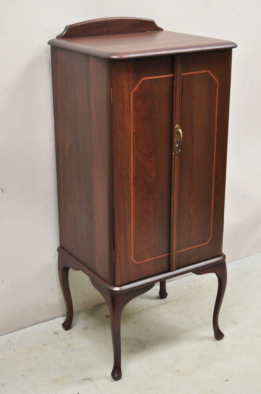 Antique Art Nouveau Mahogany 2 Door Sheet Music Cabinet with Inlay. Item features beautiful wood grain, 2 swing doors, 6 drawers, cabriole legs, nice inlay, very nice antique item, quality American craftsmanship, great style and form.  Early 1900s.