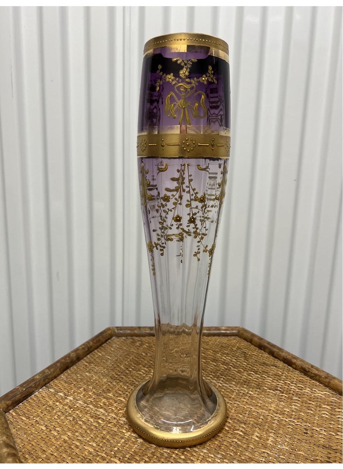 Beautifully decorated art glass vase with purple to clear tube heavily accented in gold ribbons and foliate forms!.