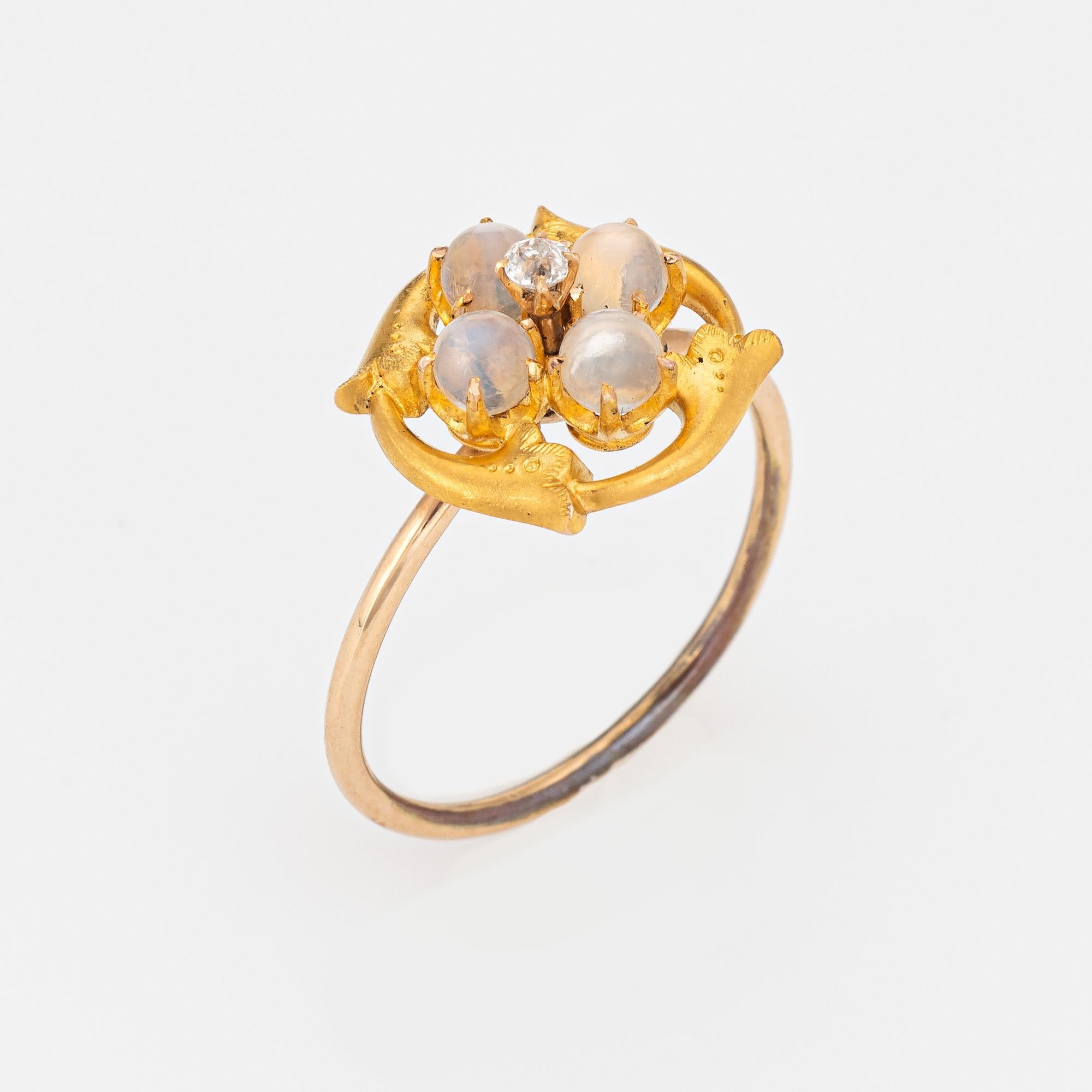 Originally an antique Victorian era stick pin (circa 1880s to 1900s), the moonstone & diamond ring is crafted in 14 karat yellow gold.

The ring is mounted with the original stick pin. Our jeweler rounded the stick pin into a slim band for the