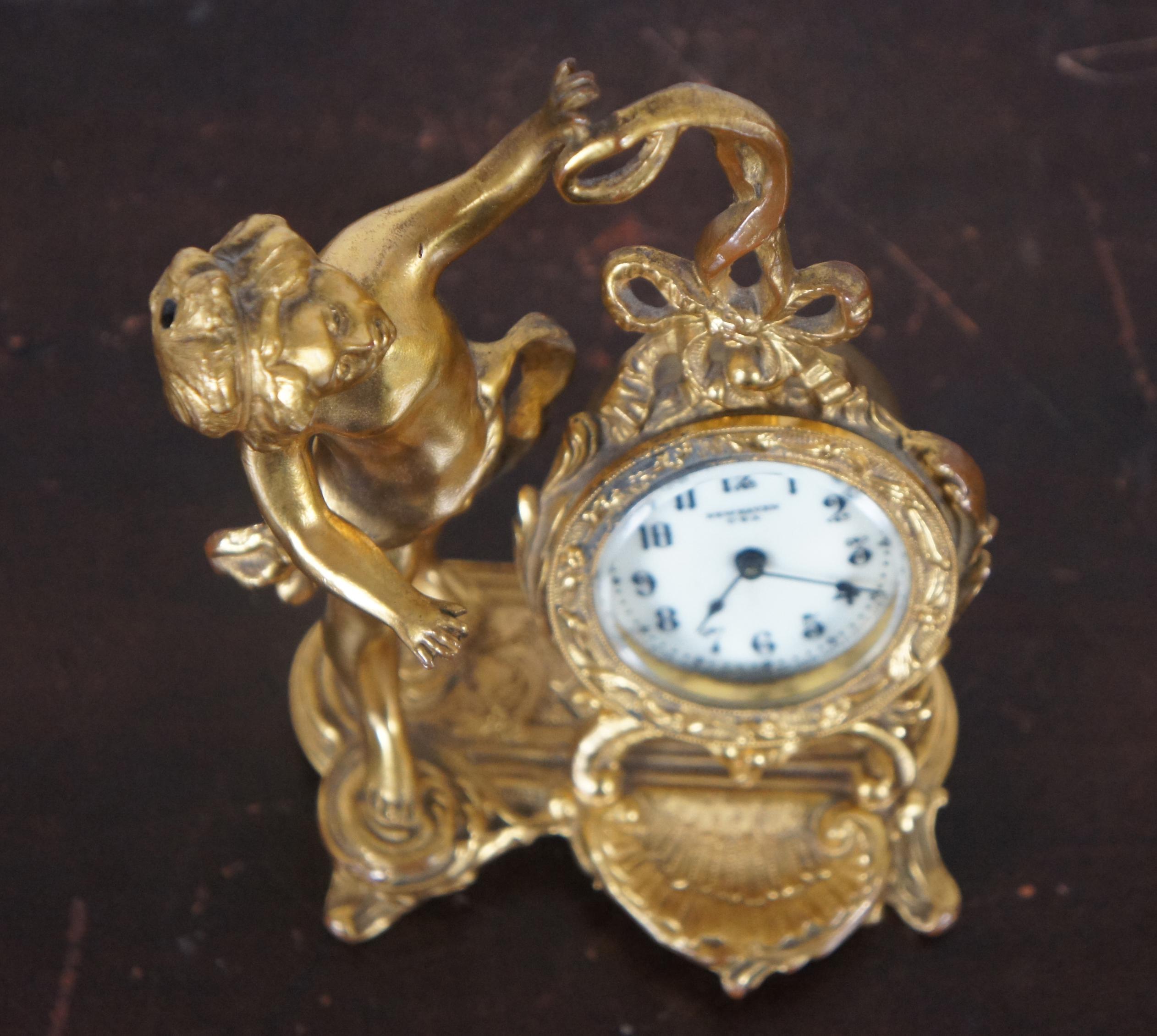 20th Century Antique Art Nouveau New Haven Clock Co Figural Gilt Metal Cherub Desk Clock