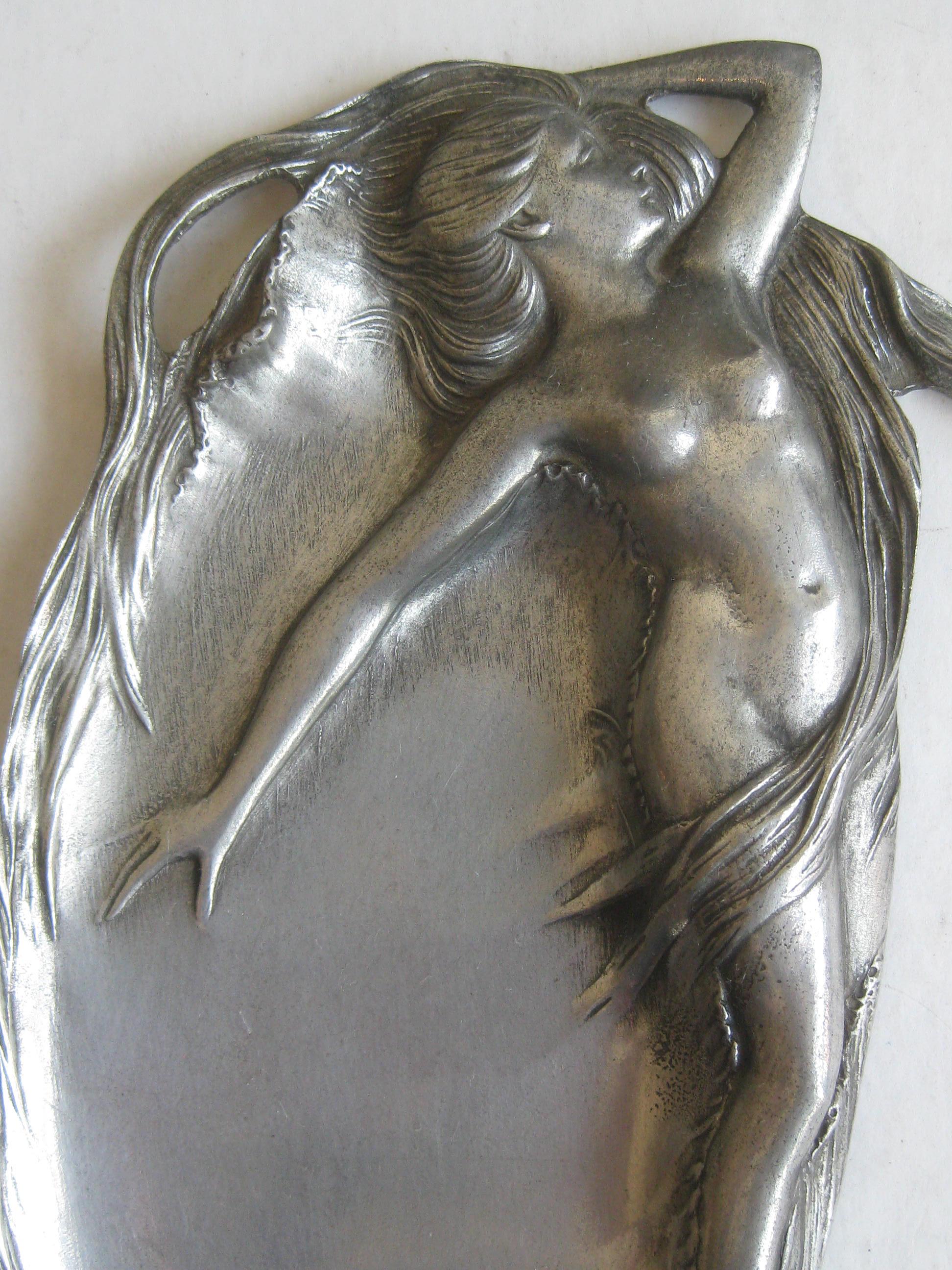 Great original Art Nouveau nude lady figural pewter tray, circa early 1900s. Great relief design. Signed on the bottom. by the company. The design has great detail and displays well. Nice original patina. In excellent original condition. Measures 8