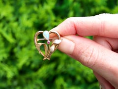 Antique Art Nouveau Opal and Ruby Yellow Gold Brooch, Circa 1910