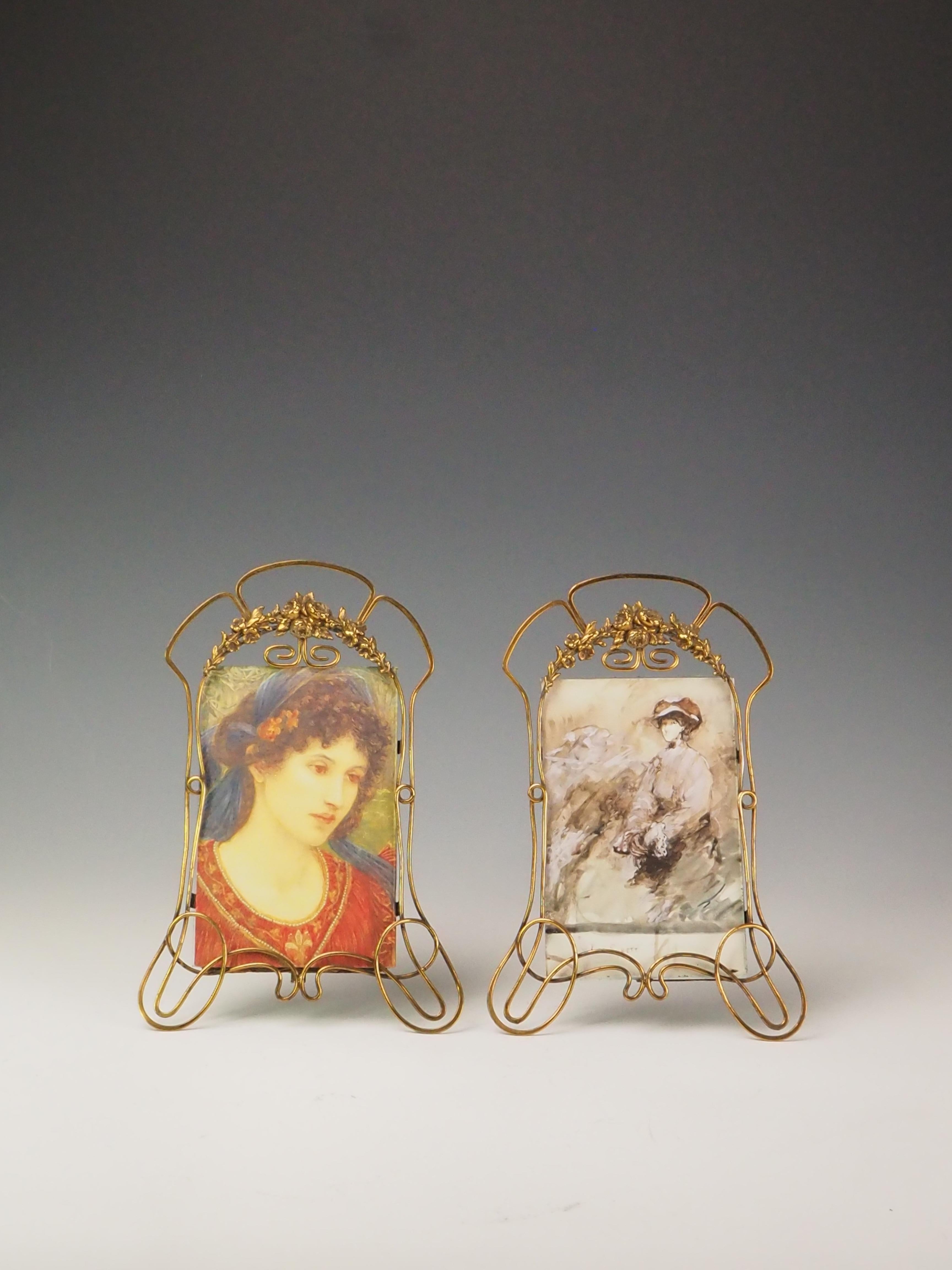 Antique Art Nouveau Pair of Wire Photo Frames – A Testament to Elegance and History

Step back in time with this rare and exquisite pair of antique Art Nouveau wire photo frames. Embodying the elegance and grace of the early 20th century, these