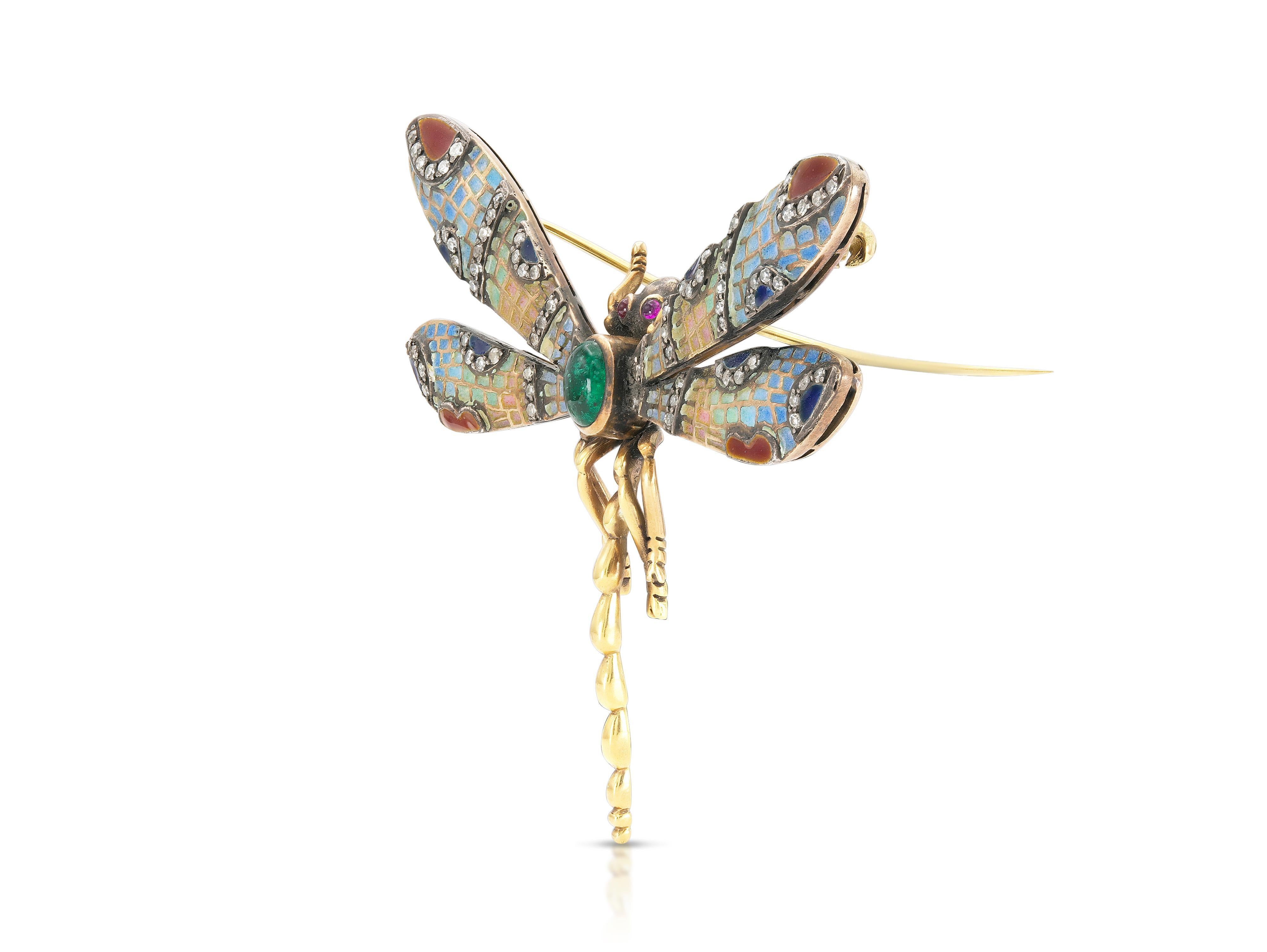 Finely crafted in 18k yellow gold and enamel with a Cabochon Emerald, Cabochon Rubies, and Single cut Diamonds.
Circa 1890s-1910s
2 1/4 x 2 1/2 inches