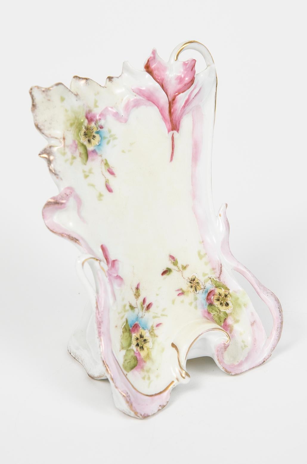Art Nouveau intrically designed porcelain menu with figural open work flower stems and raised flowers.  Beautiful hand painted design featuring pansey flowers with gilt centers.  So well done that even the back has raised painted flowers.