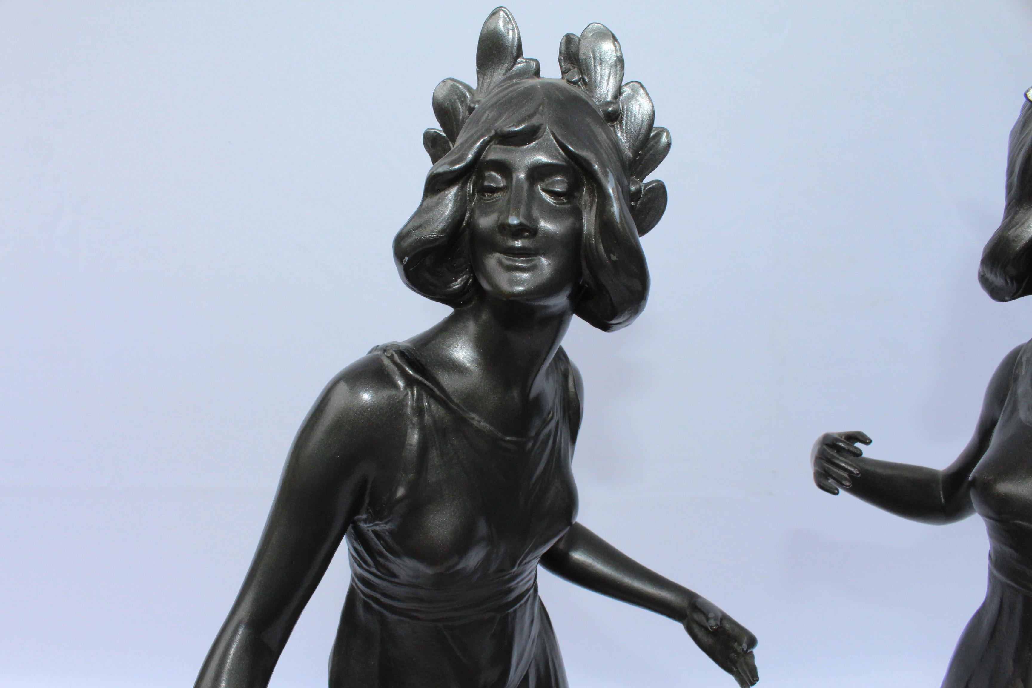 A pair of lady sculptures, Art Nouveau, circa 1900 cast in spelter and restored finish. They look great. No chips to the marble. No signatures. 24 1/2