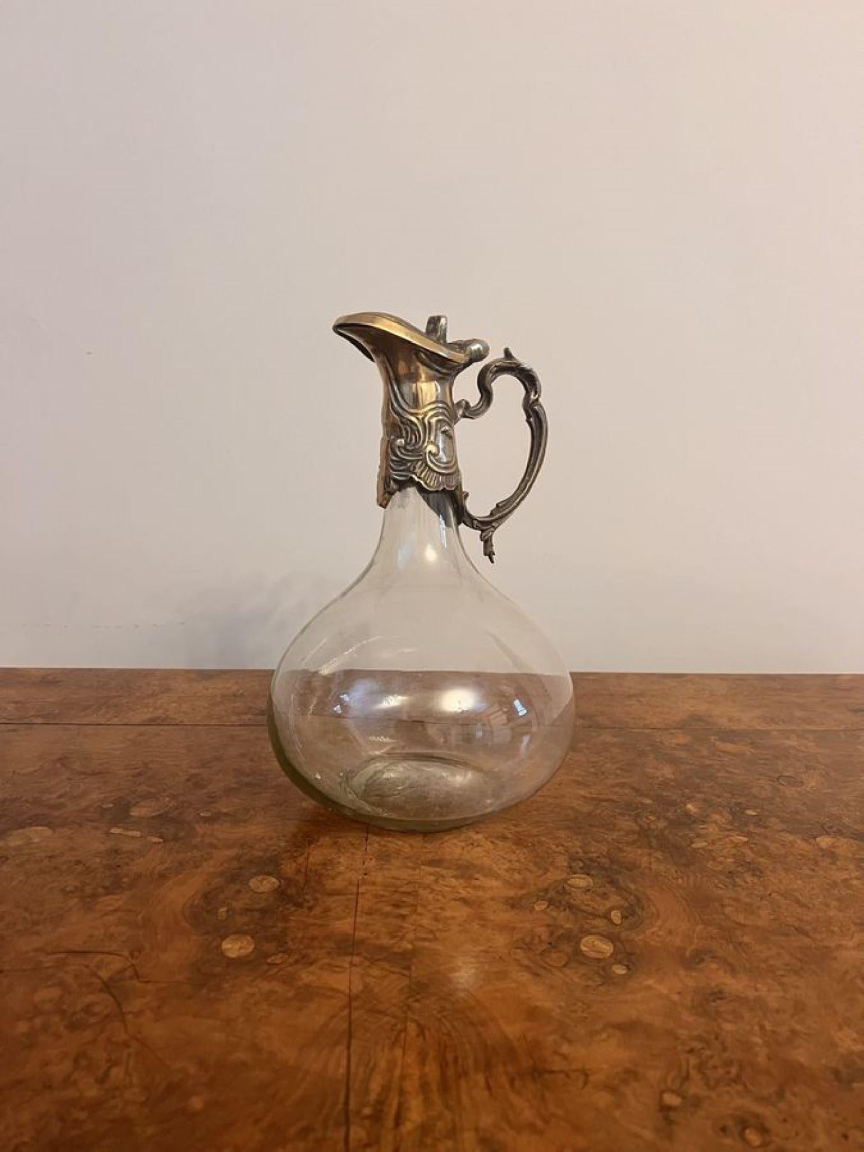 Antique art nouveau quality silver plated claret jug, having an art nouveau shaped handle, decorated lid with a lift up top above a bulbous shaped claret jug. 

D. 1895