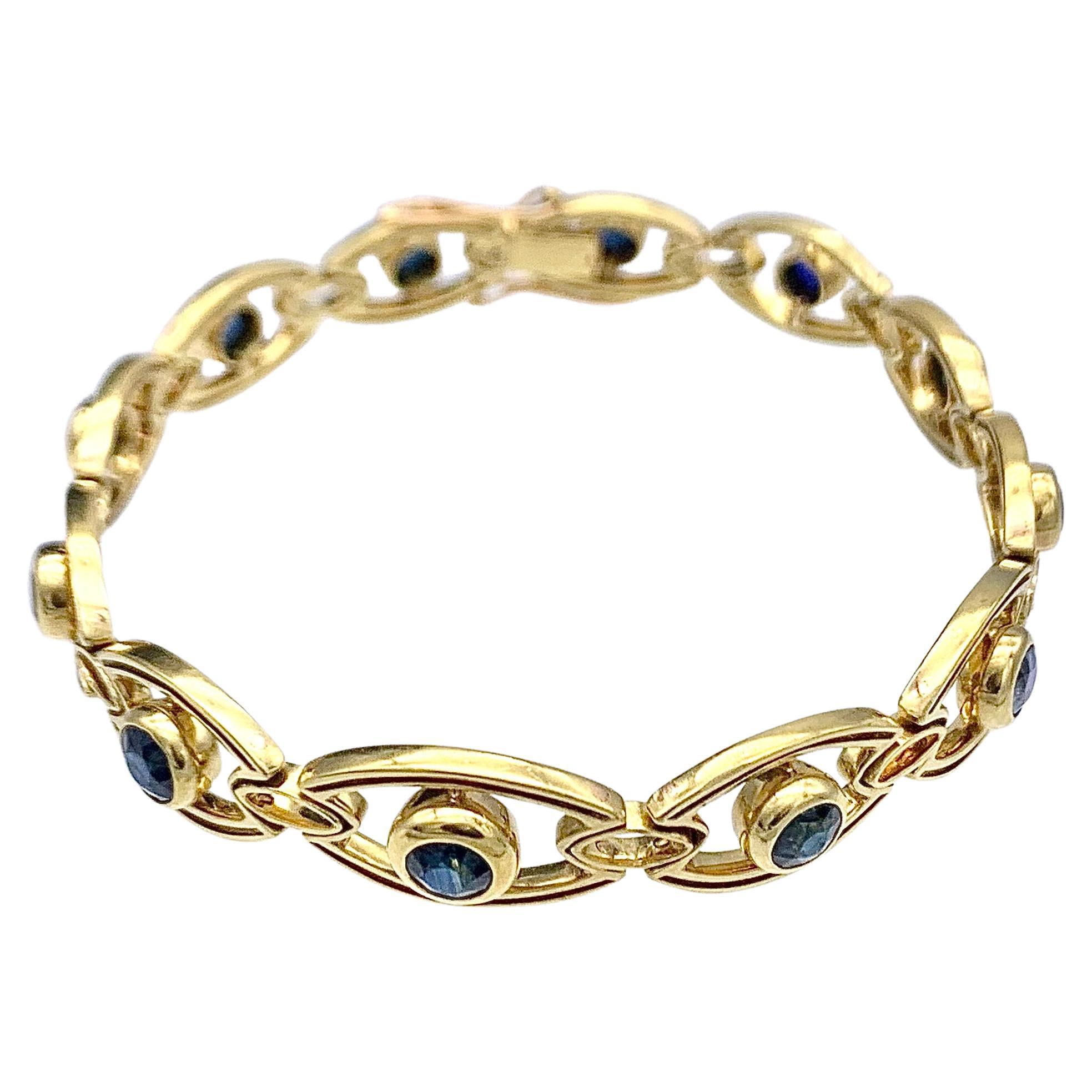 Bracelet à maillons ancien Art nouveau en or jaune 14 carats avec saphirs en vente