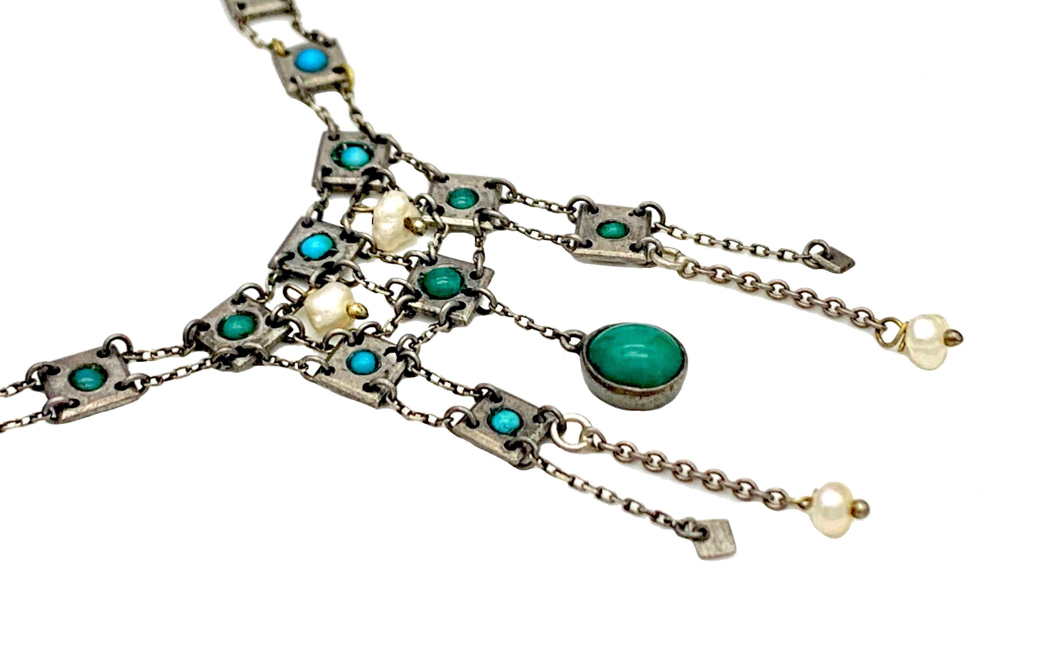 This delicate flexible link dangling necklace was executed in the secessionist style around 1905. It is most likely of European origin, however, an attribution to a specific country is not easy.
It is made out of metal and set with different size