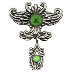 Spilla antica in stile Art Nouveau in argento e pietre verdi