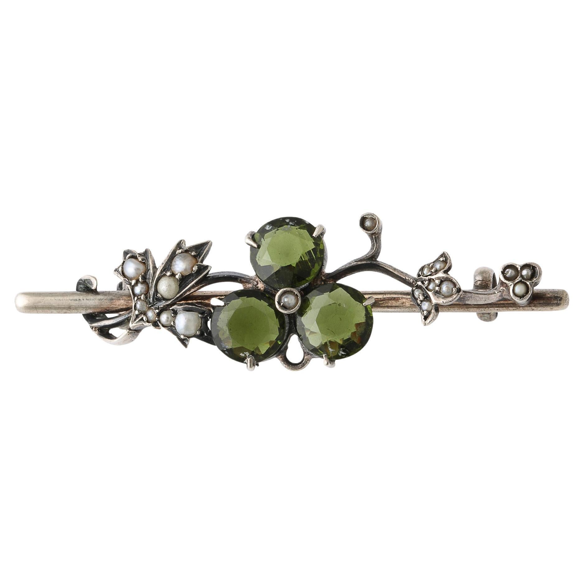 Antique  Art Nouveau Silver Floral Bar Pin Set with Peridots and Seed pearls For Sale