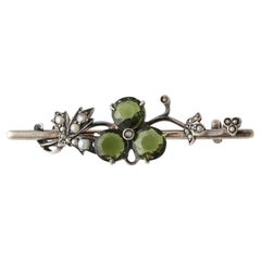 Antique  Art Nouveau Silver Floral Bar Pin Set with Peridots and Seed pearls