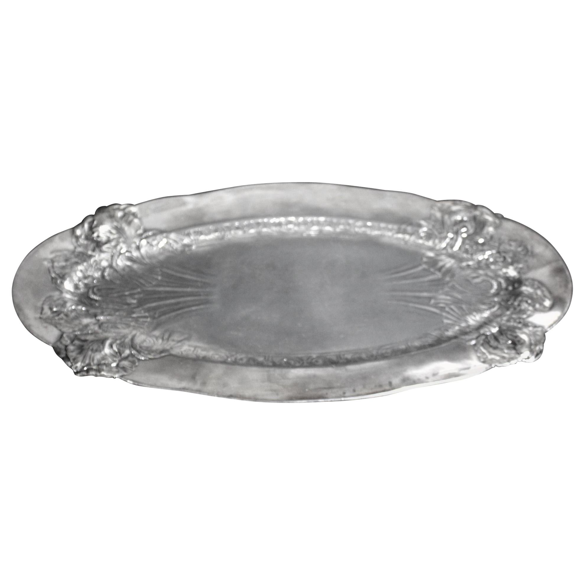 Antique Art Nouveau Silver Plated Oval Serving Tray with Raised Floral Motif For Sale