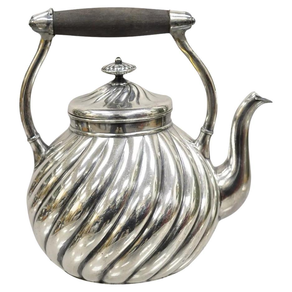 Antigua tetera Art Nouveau plateada con diseño en espiral Tetera