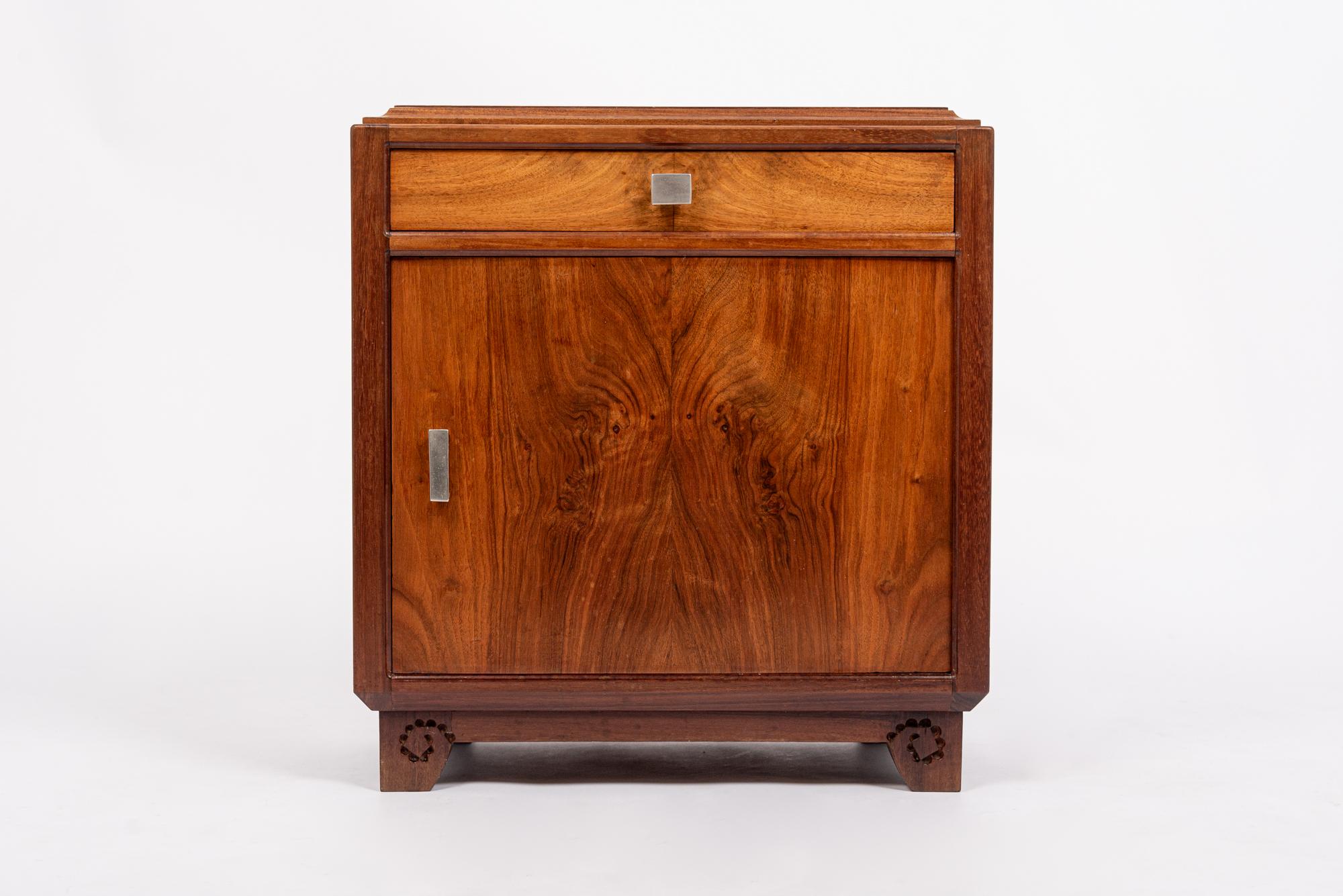 This lovely antique French Art Nouveau wood commode or nightstand was designed by Louis Majorelle and made in Nancy, France circa 1910-1920. This exceptional, museum-quality cabinet exemplifies elegant, Art Nouveau design. It is expertly crafted