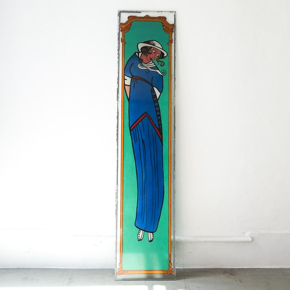 This Art Nouveau Painted Glass was produced in Portugal, by Covina - Companhia Vidreira Nacional, during the 1930's. It belonged to a door or a window and is a hand painted behind glass with a female figure and ornaments around it. In original and
