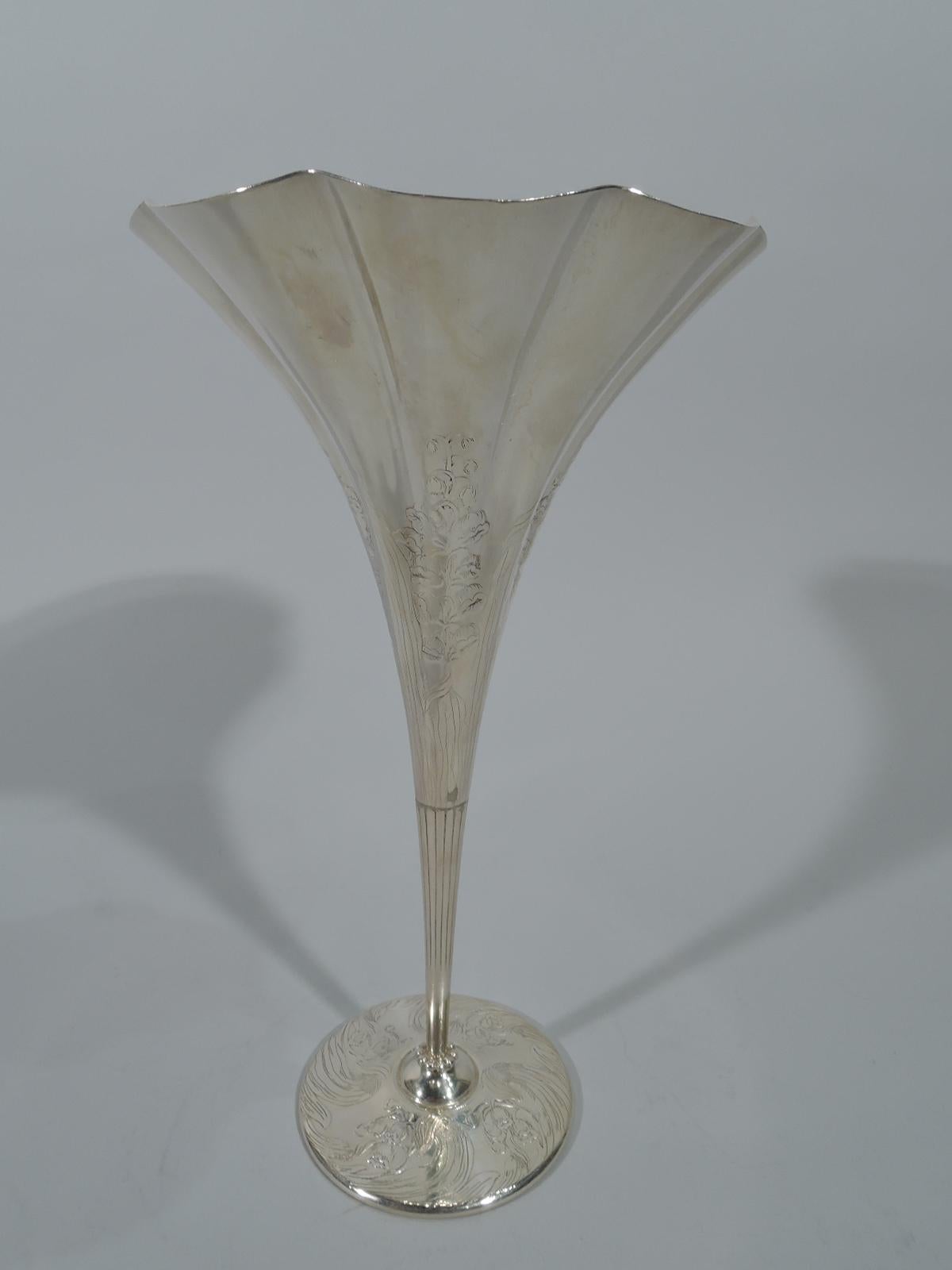 Art Nouveau sterling silver vase. Made by Tiffany & Co. in New York. Fluted cone on small beaded dome mounted to flat circular foot. Acid-etched flowers and foliate scrolls on top part and foot. Incised flutes on lower part. Hallmark includes