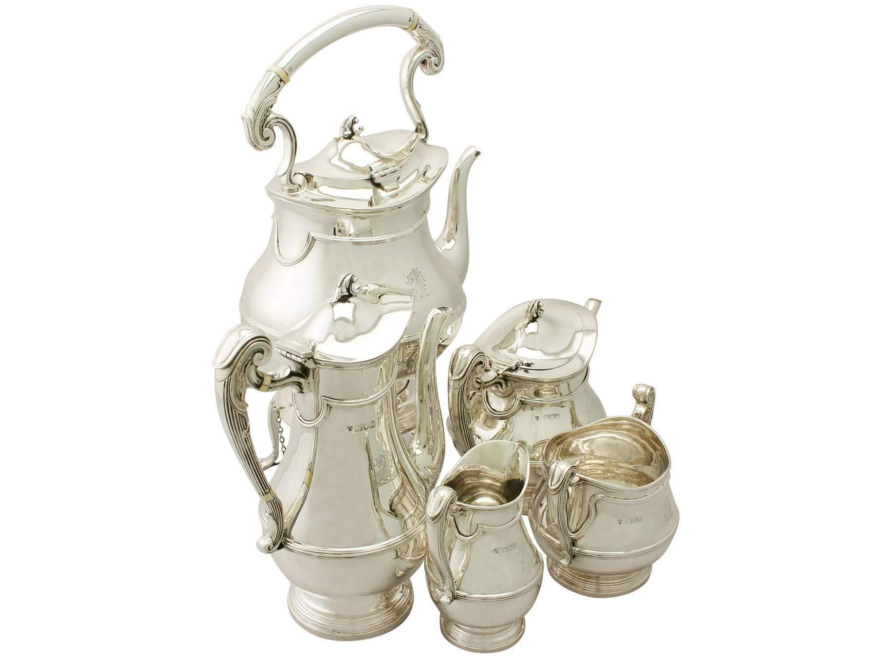 A magnificent, fine and impressive antique Edwardian English sterling silver five-piece tea and coffee set/service made in the Art Nouveau style, part of our silver teaware collection.

This magnificent antique Edwardian sterling silver five-piece