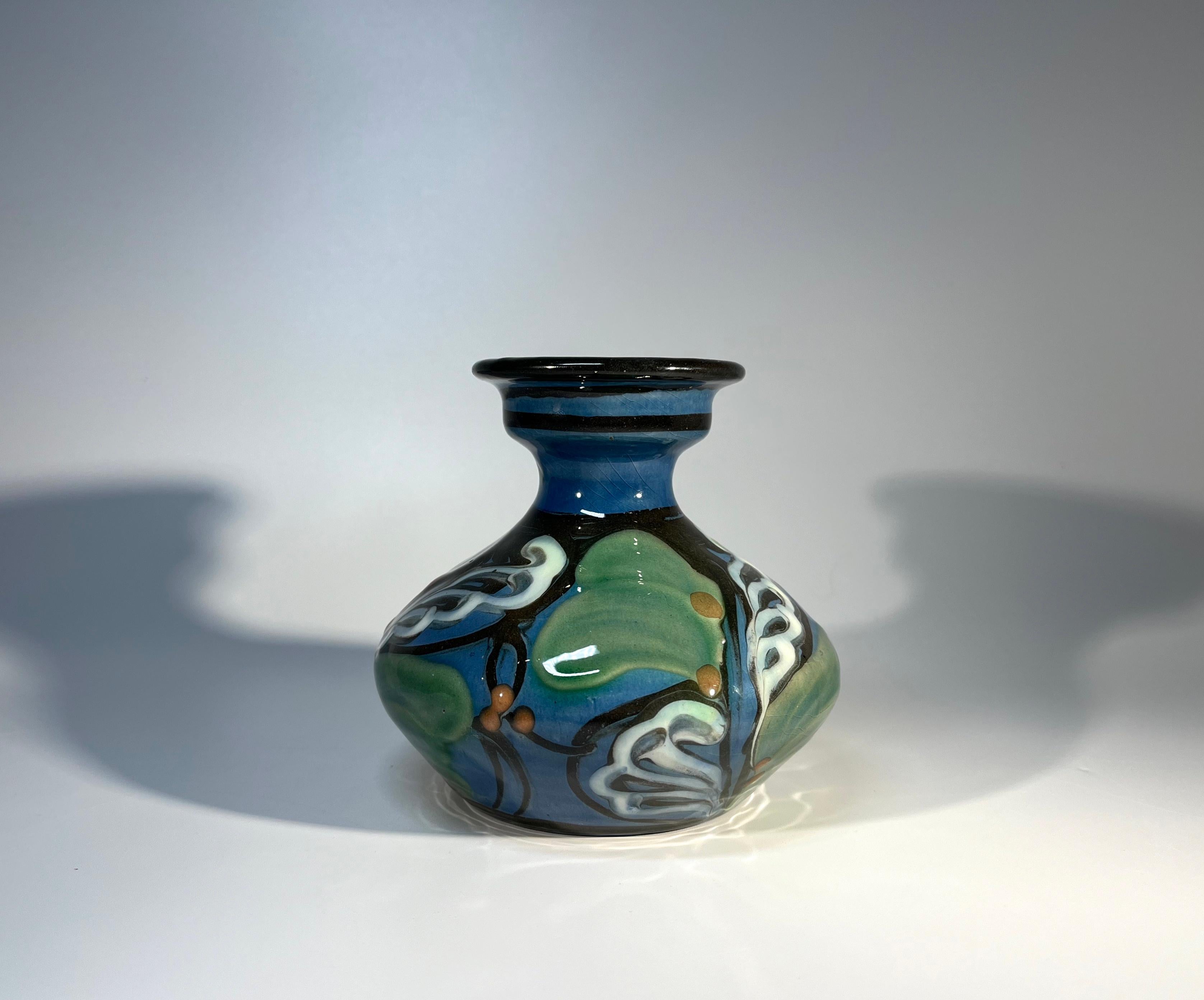 Art nouveau in design and era, a fabulously glazed ceramic vase by Horsens Danico Denmark
A super little vase to collect
Circa 1920's
Signed Danico, 221 Denmark
Height 4.25 inch, Diameter 4.75 inch
Very good condition. Clean crazing to interior