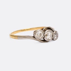 Antique Art Nouveau Three-Stone Diamond Crossover Ring
