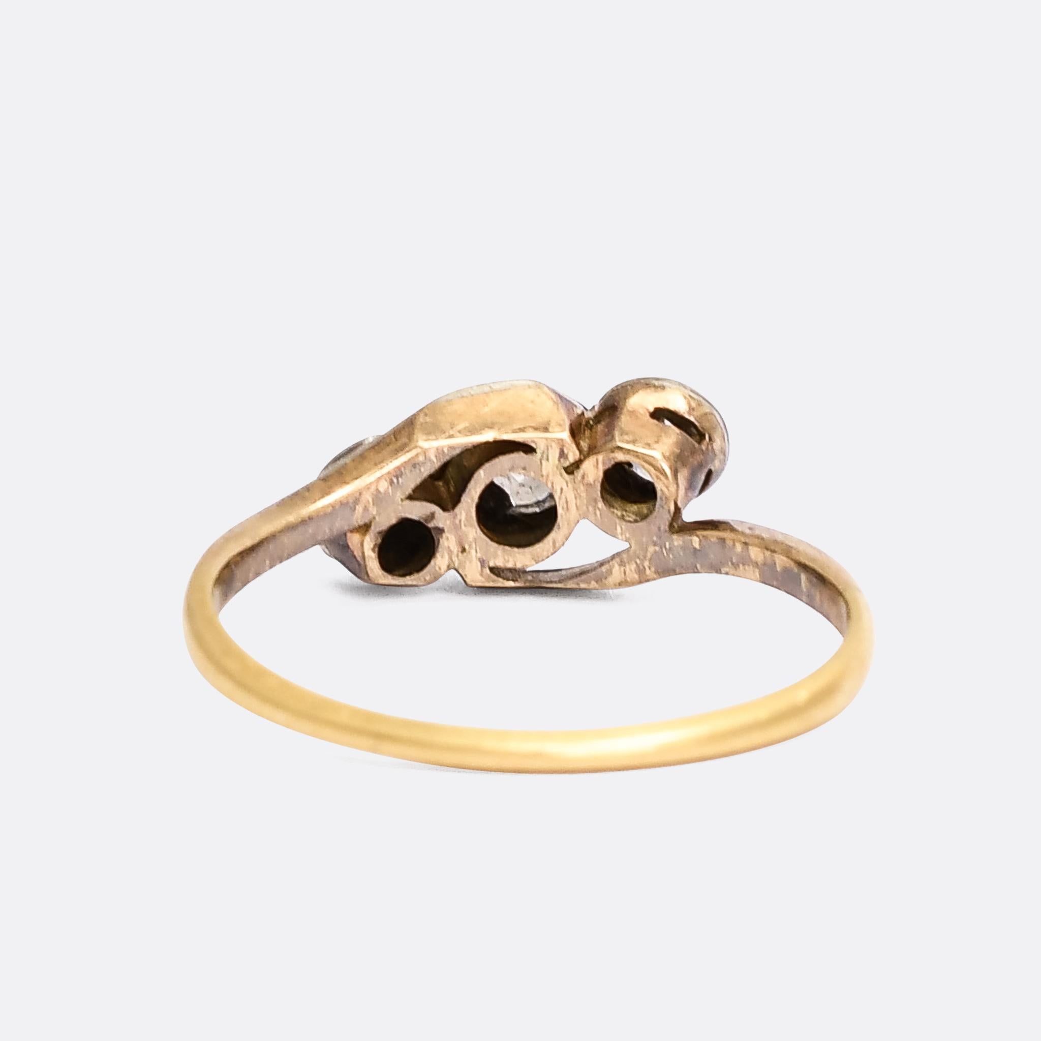 3 stone crossover ring