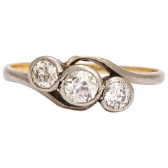 Antique Art Nouveau Three-Stone Diamond Crossover Ring