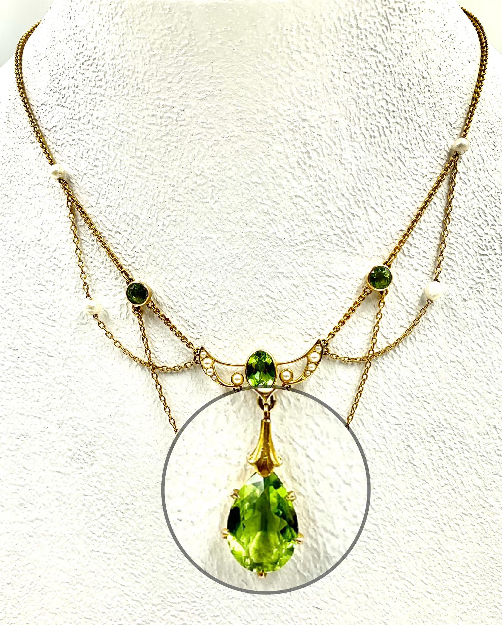 Antique Art Nouveau Winged Heart Peridot Pearl 14K Gold Edwardian Necklace In Good Condition For Sale In New York, NY