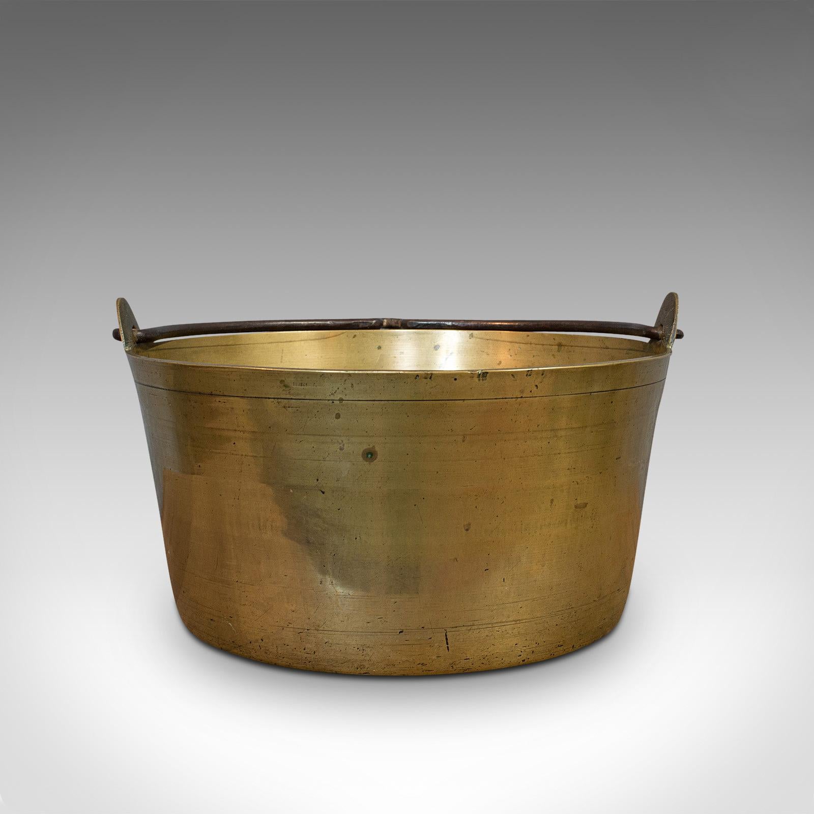 His is an antique artisan jam pan. A French, solid brass kitchen pot, dating to the Victorian period, circa 1900.

Charming, French small batch cookware
Displaying a desirable aged patina – shows pleasing weathering
Solid brass polished to a