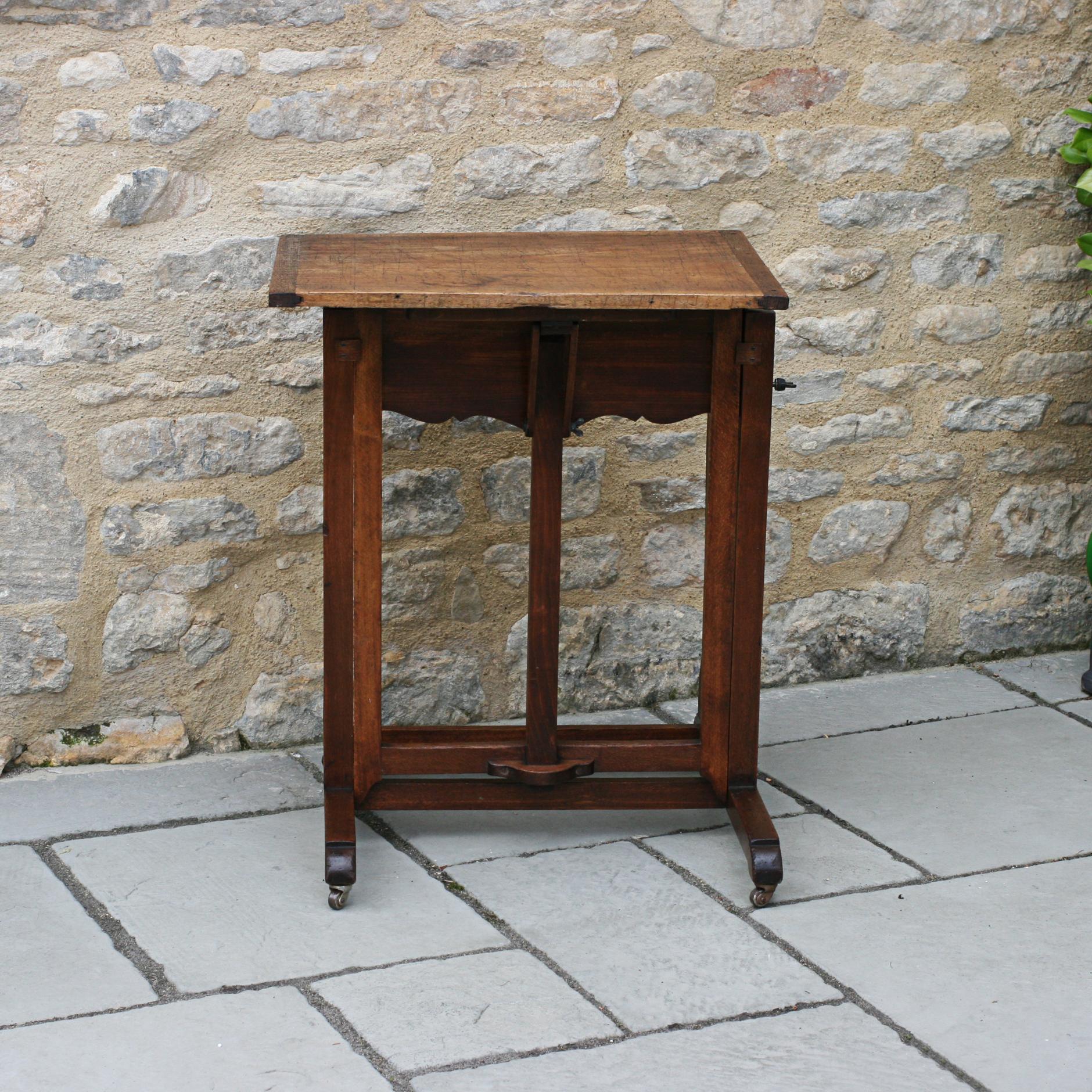 Metamorphic Artists Studio table easel.
A very versatile artists easel come table. The whole piece of equipment is versatile and adjustable, it is made of beechwood and is raised on four castors. The item can be used as a normal table for working,