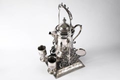 Hartford Silverplate Aesthetic Movement Tilting Water Pitcher on Stand with Cups