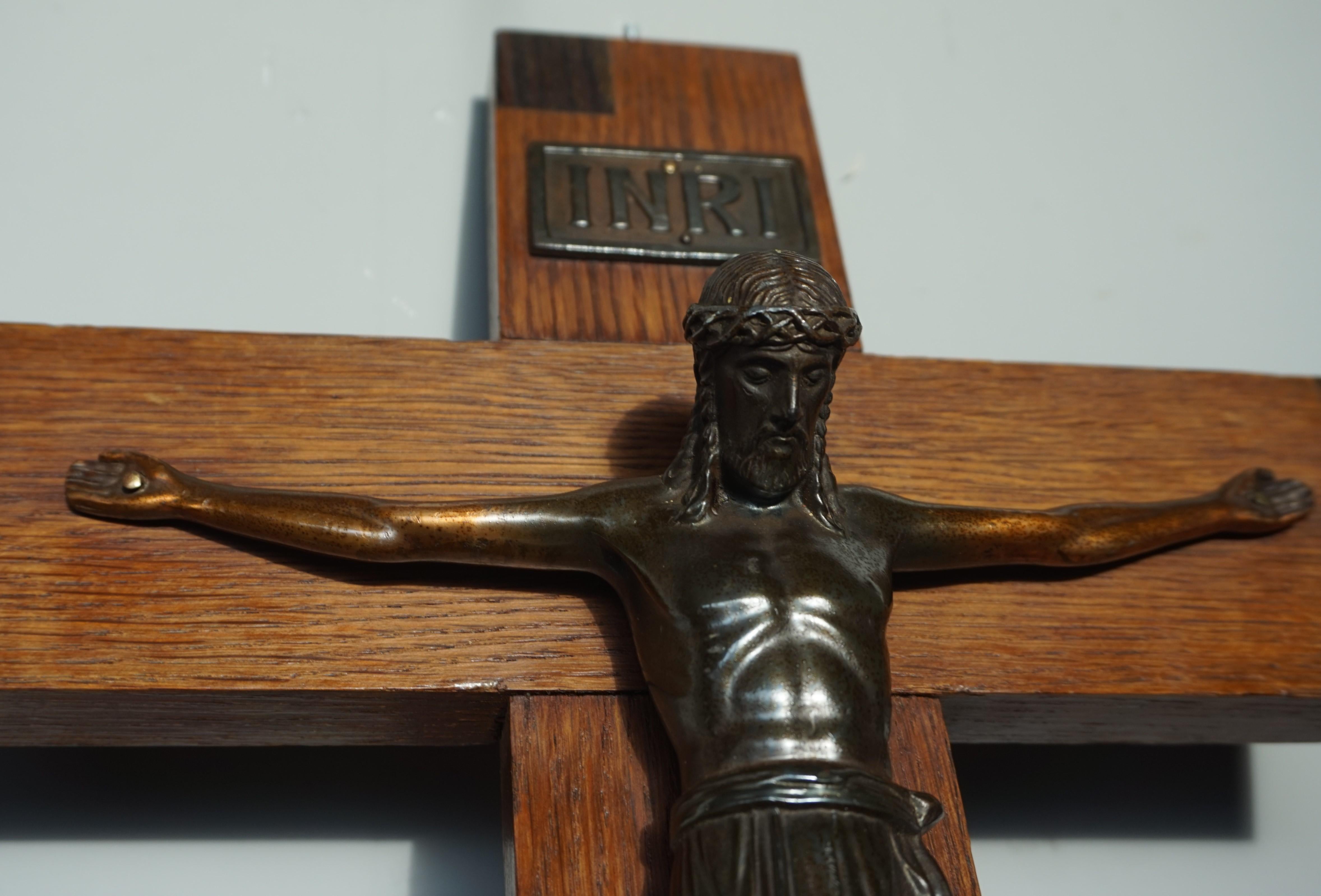 Stylish and quality handcrafted, early 1900s crucifix.

This very good quality crucifix comes with an incredibly detailed corpus and head of Christ and a striking, solid oak wooden cross with inlaid motifs of coromandel. We have sold some rare and